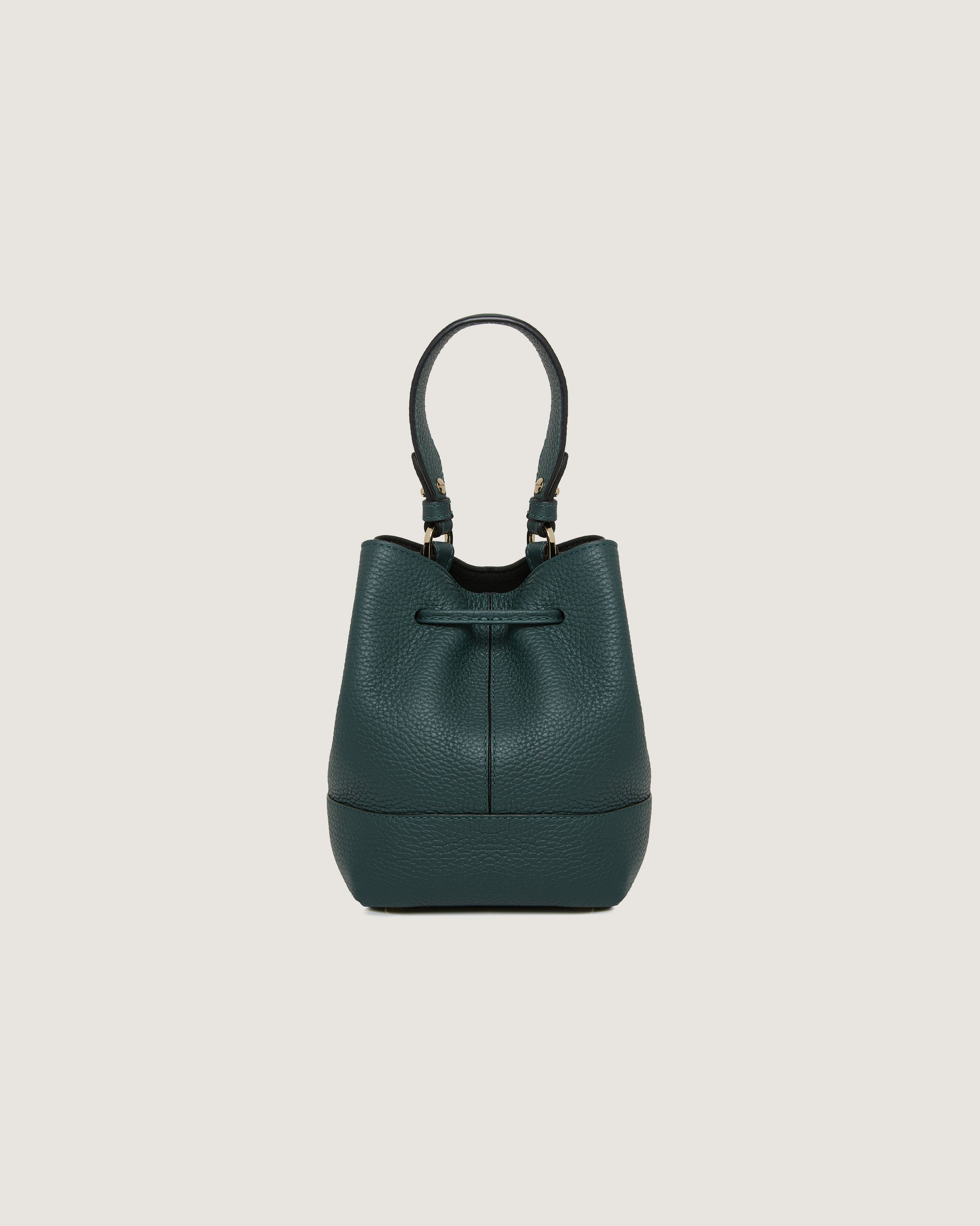 A green handbag on a white background