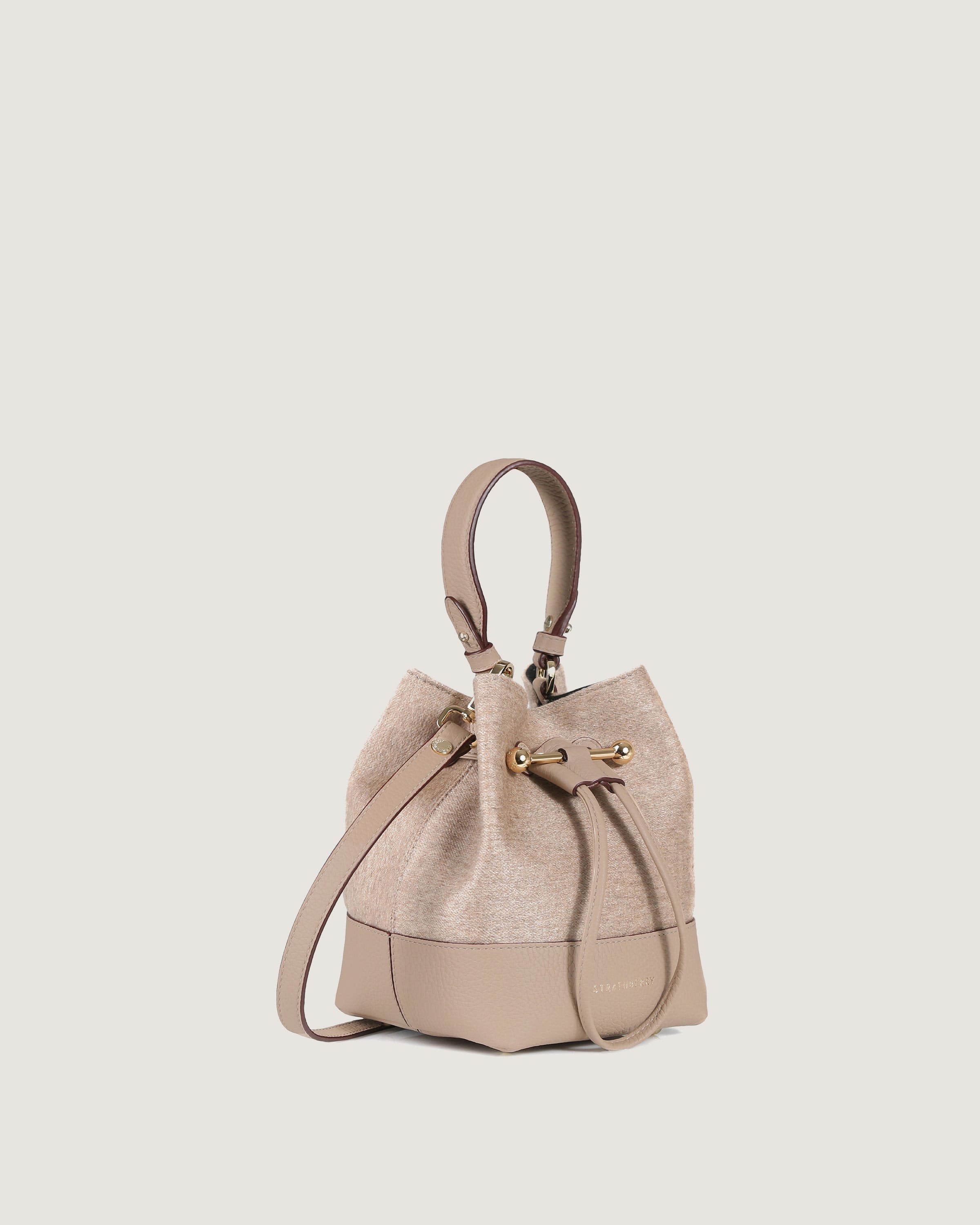 A handbag with a handle on a white background