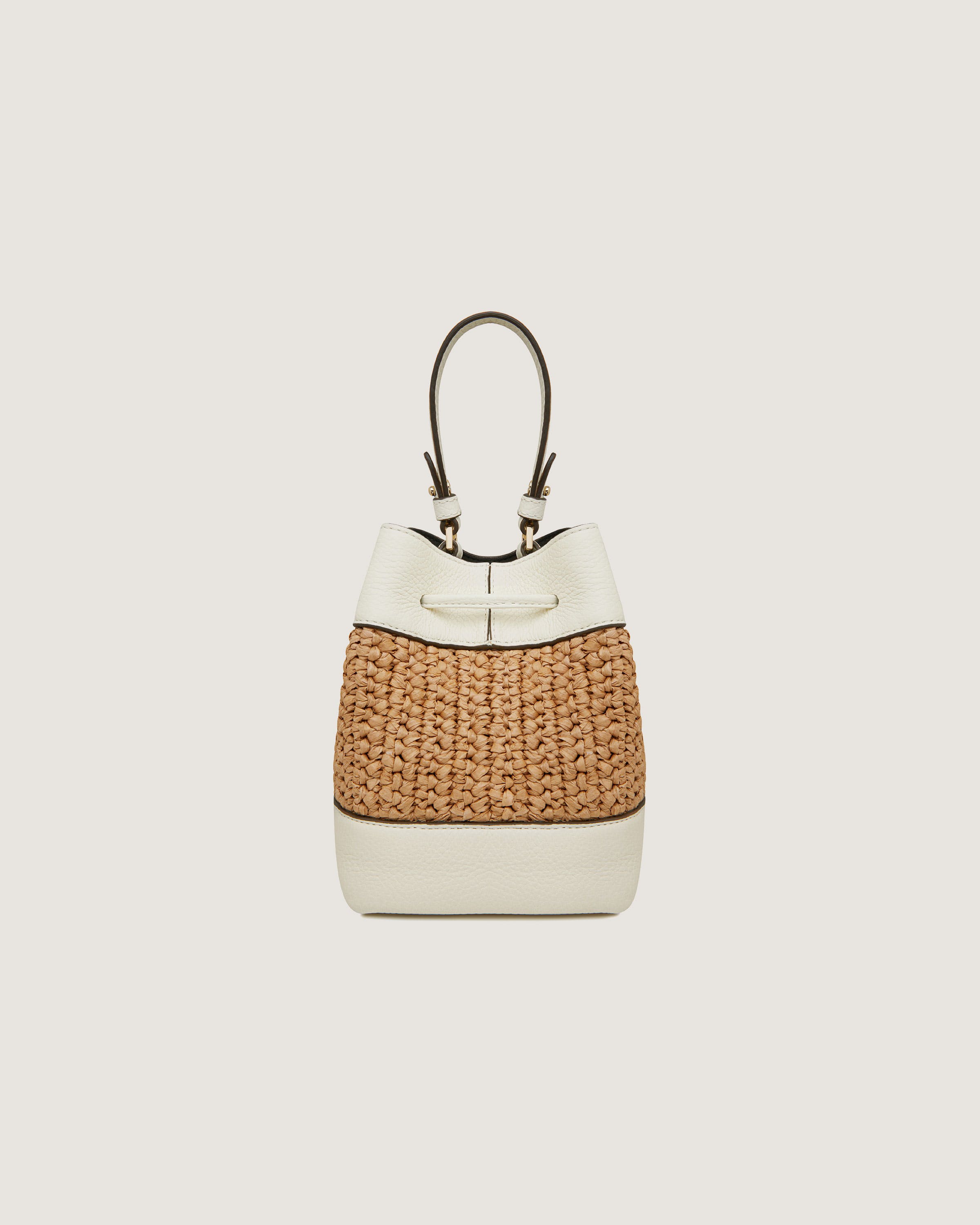 A white and brown handbag on a white background