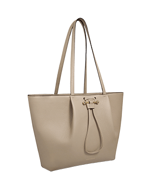 A beige leather tote bag on a white background