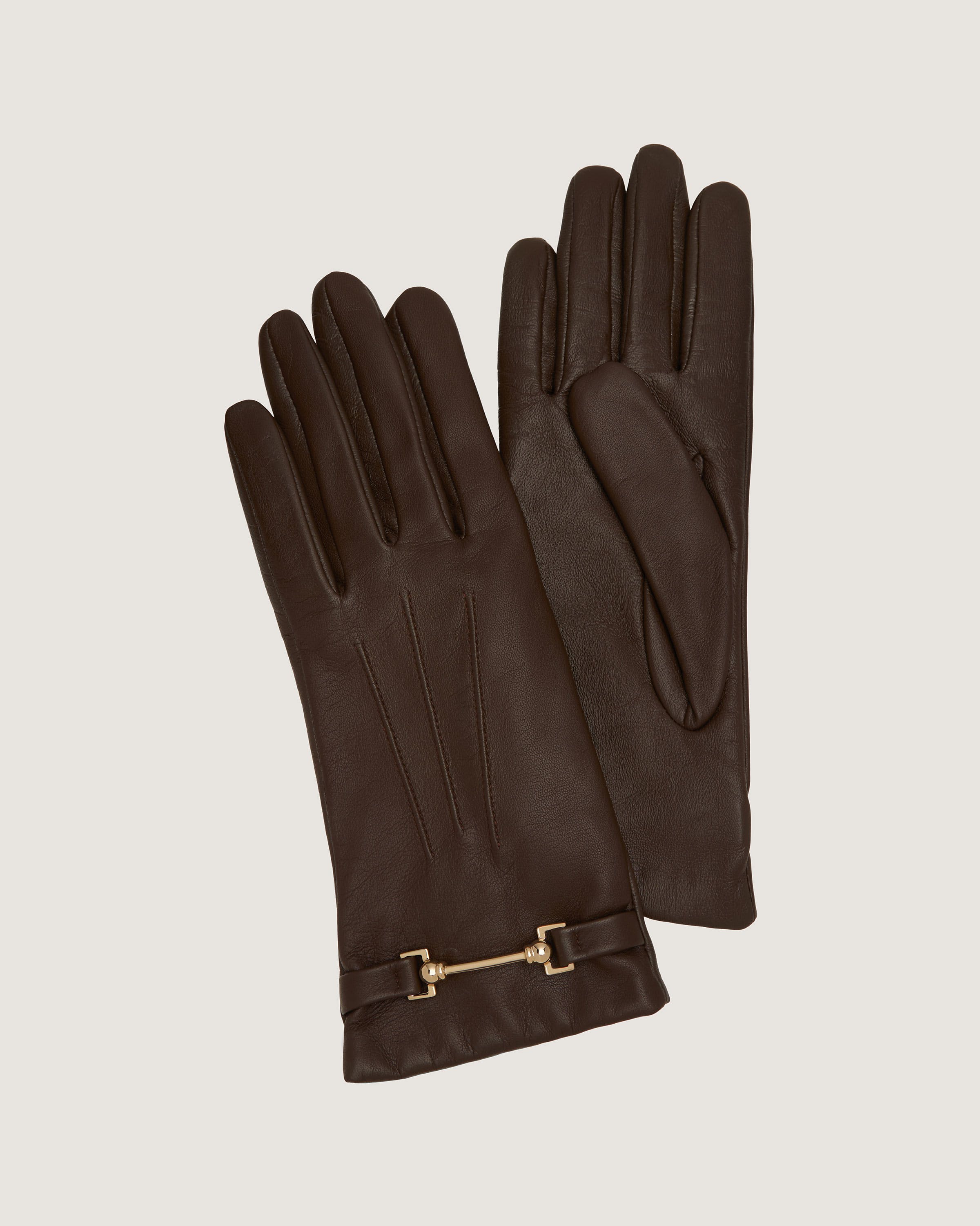 A pair of brown leather gloves on a white background