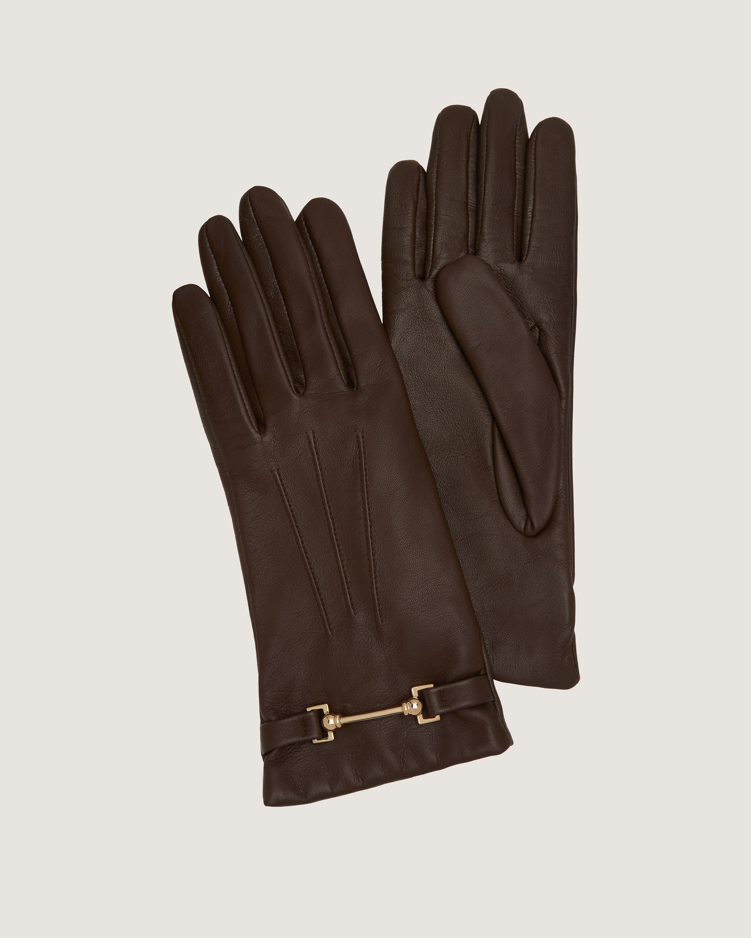 A pair of brown leather gloves on a white background