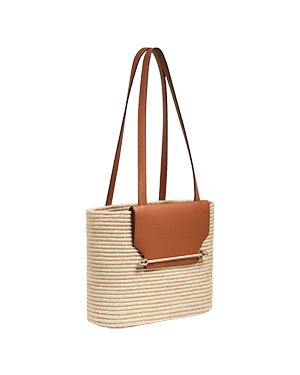 A handbag with a brown leather handle