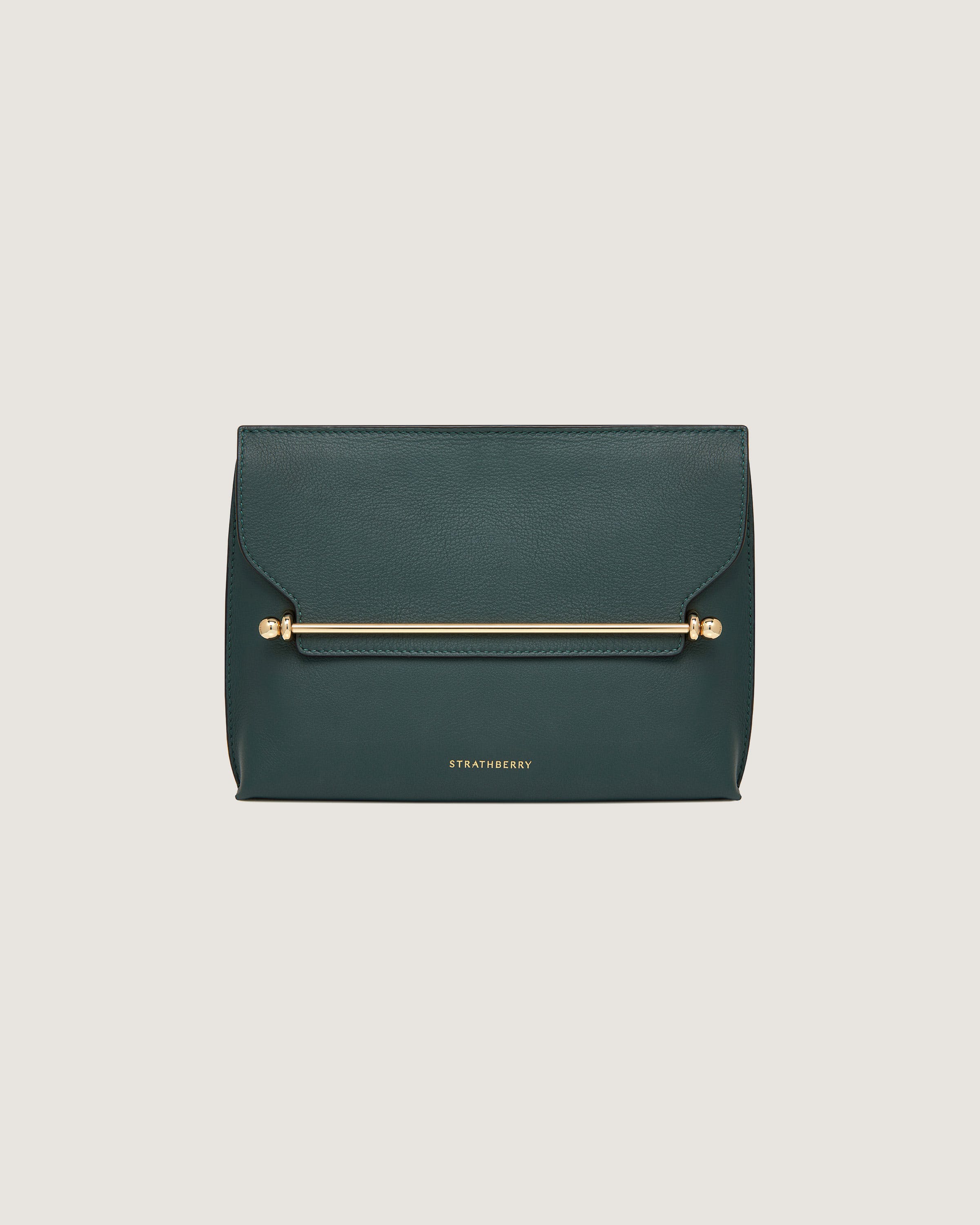 A green clutch bag with a gold handle