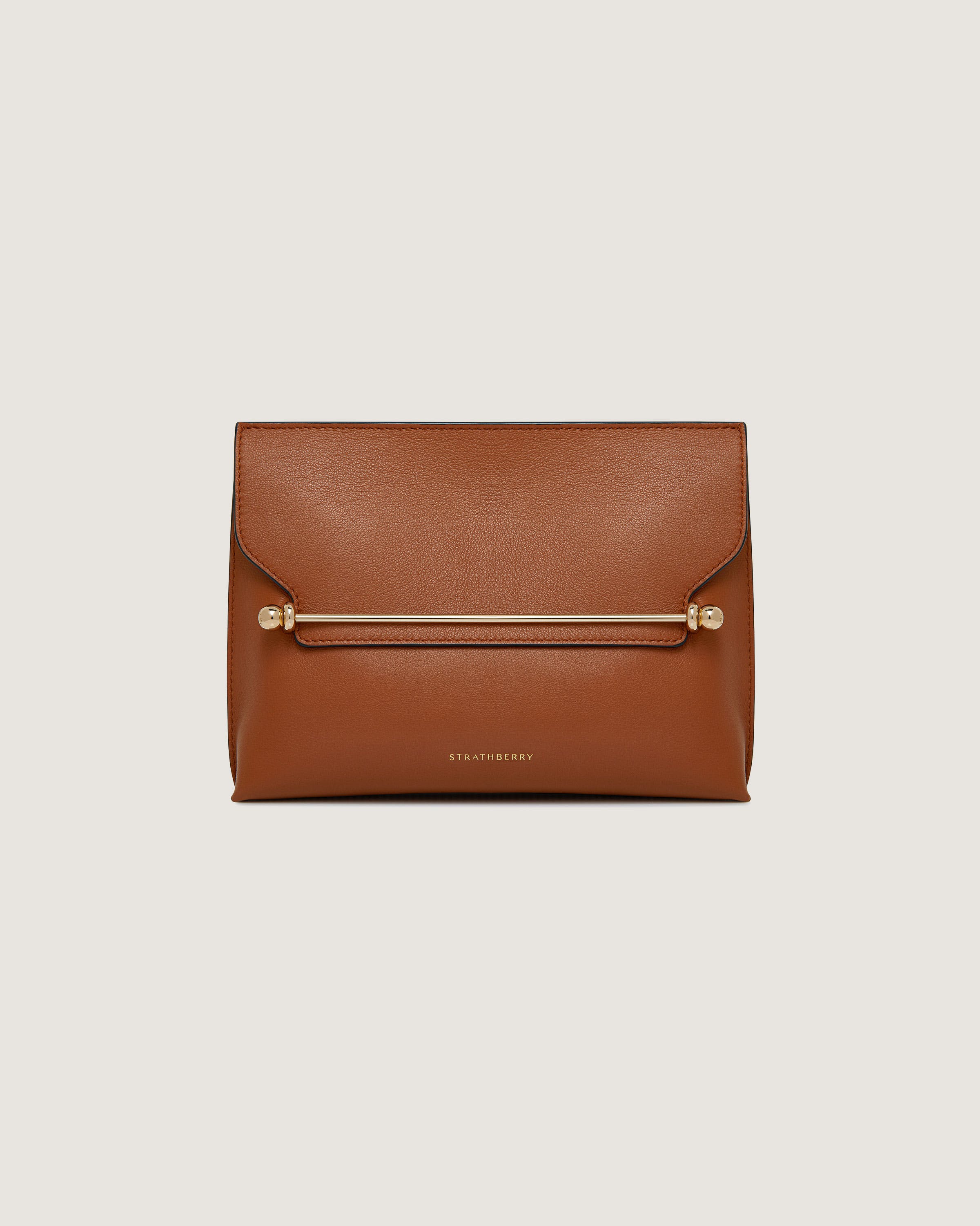 A brown leather clutch bag with gold hardwares