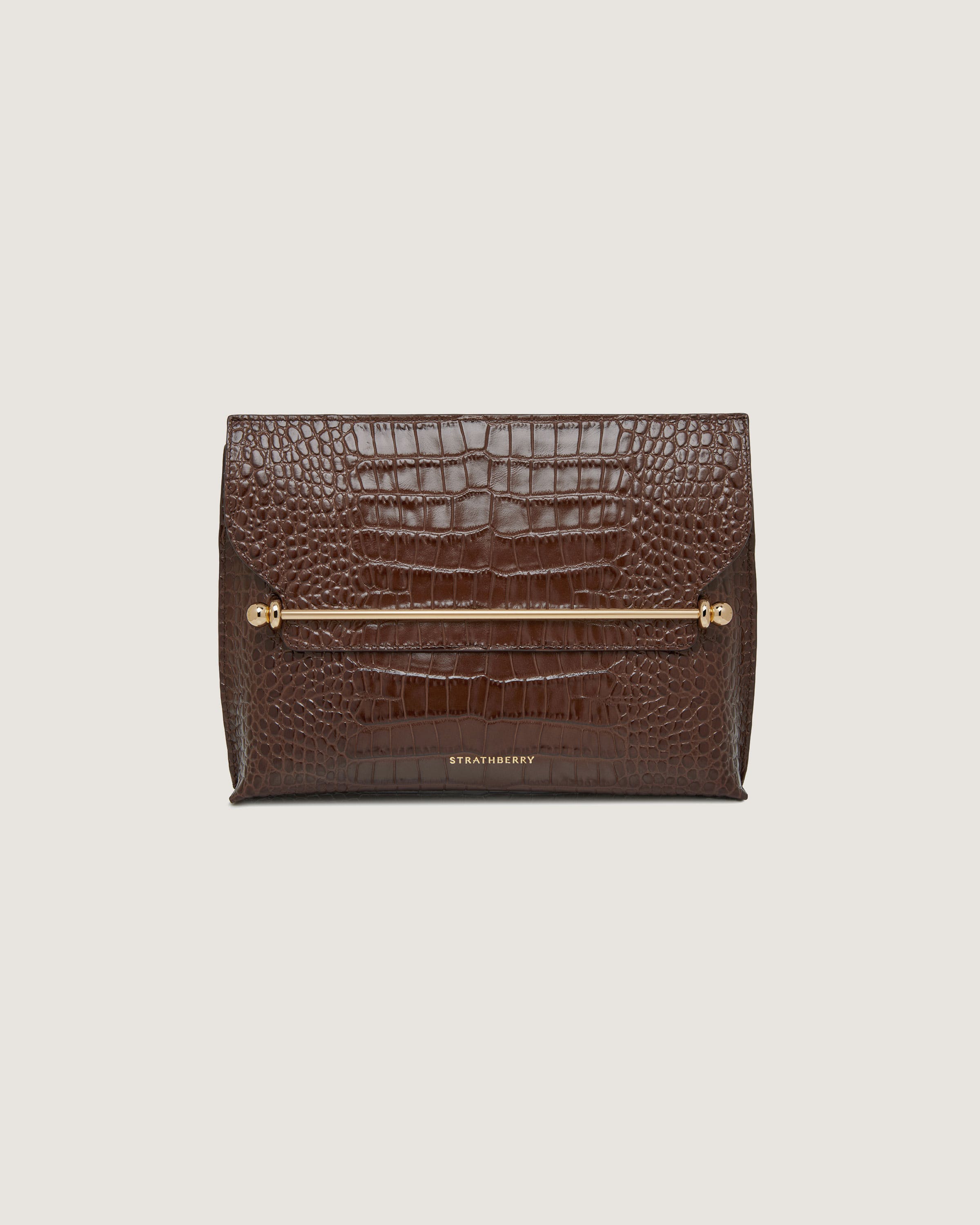 A brown crocodile - embossed leather clutch bag