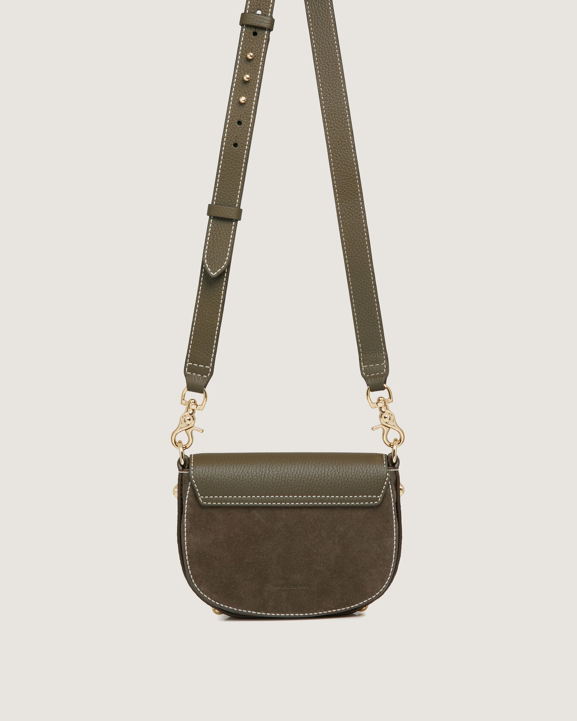 A small cross body bag with a chain strap