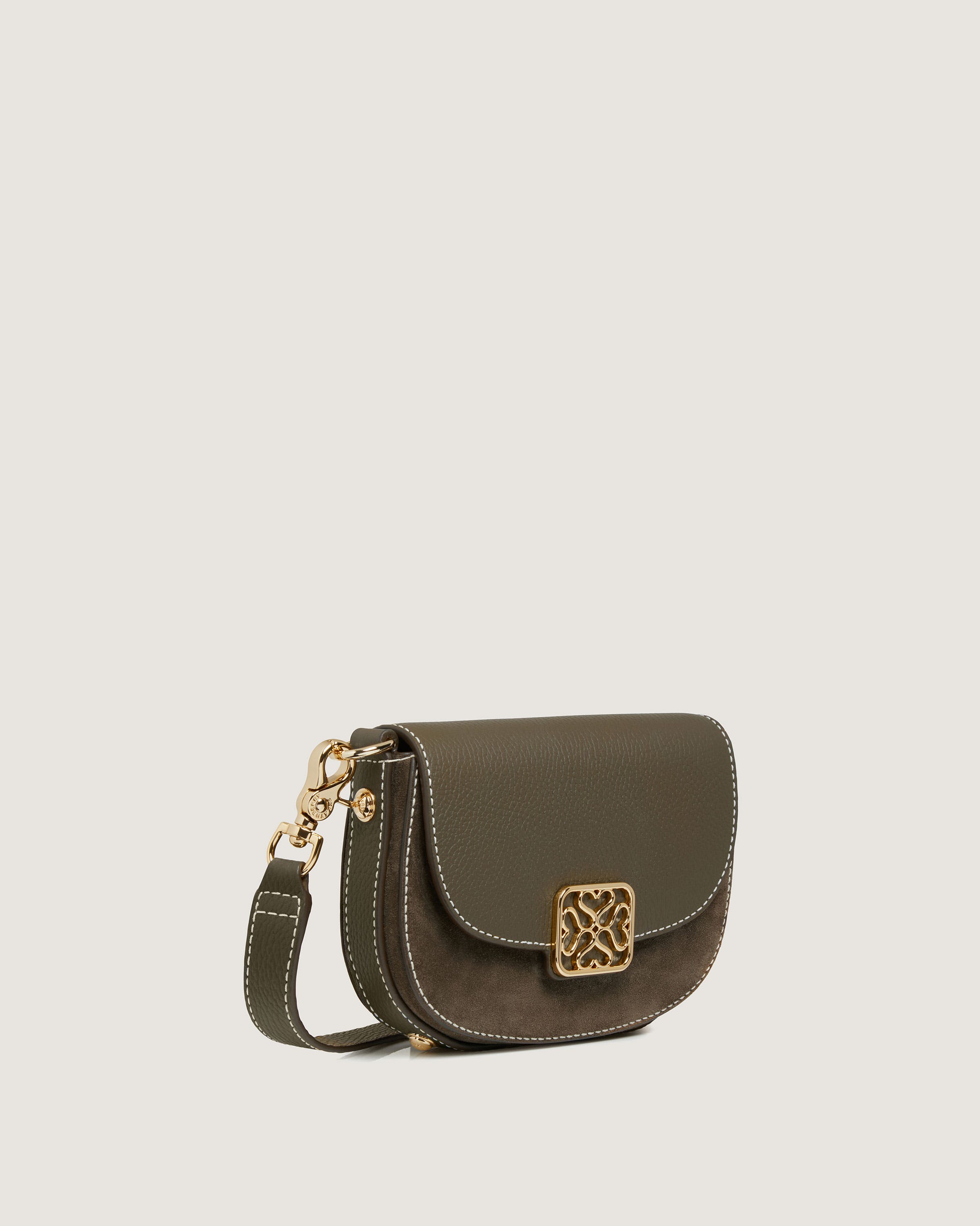 A small cross body bag with a chain strap