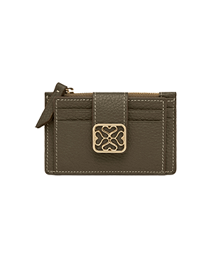 A brown card case with a gold buckle