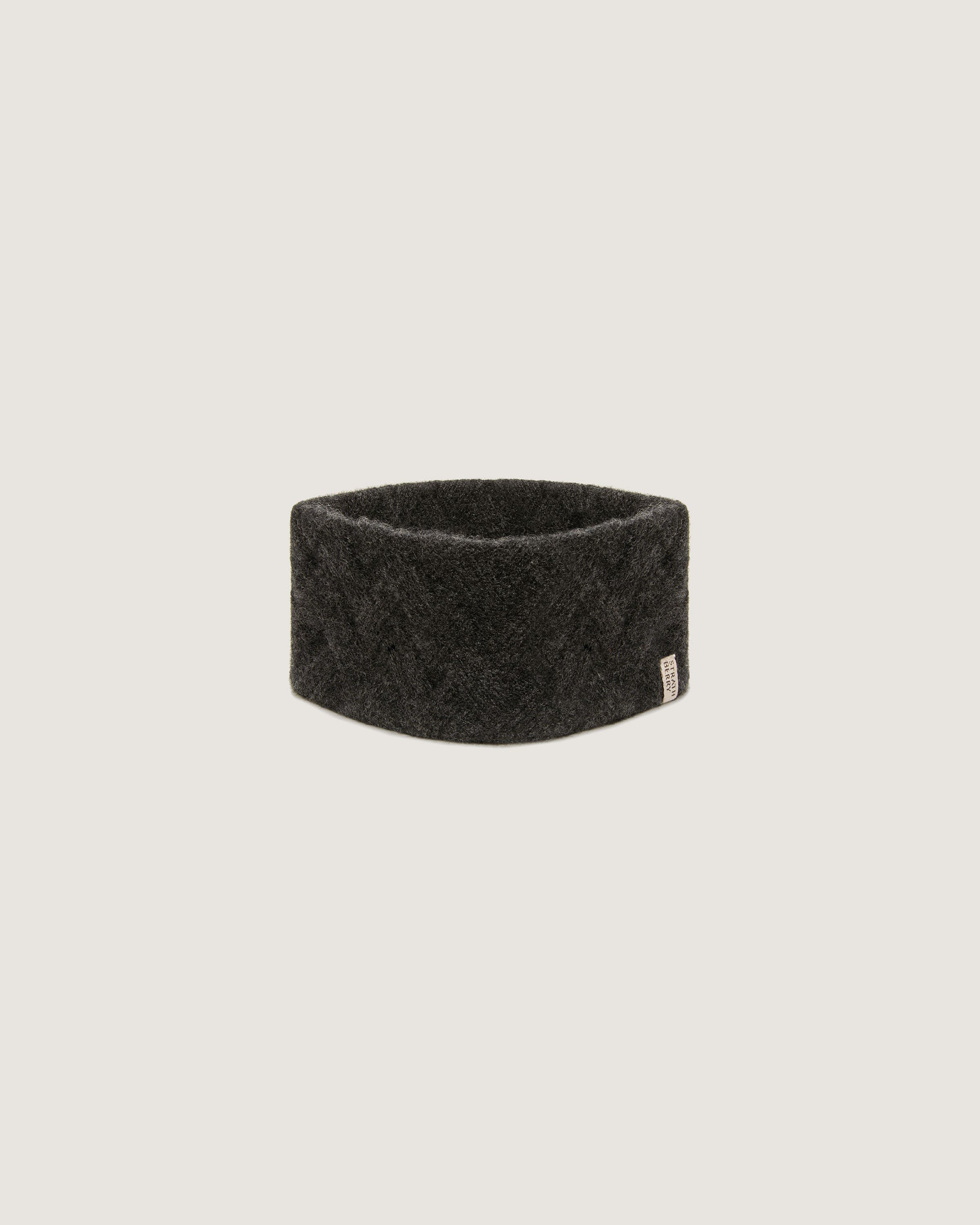 A black headband on a white background