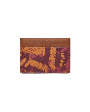 A wallet with a butterfly pattern on it