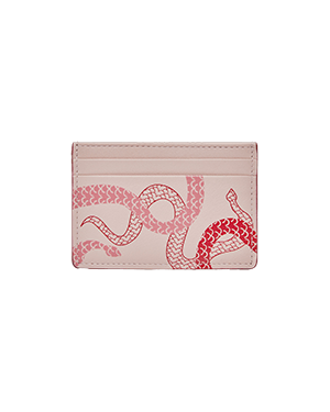 A pink card case with a snake on it