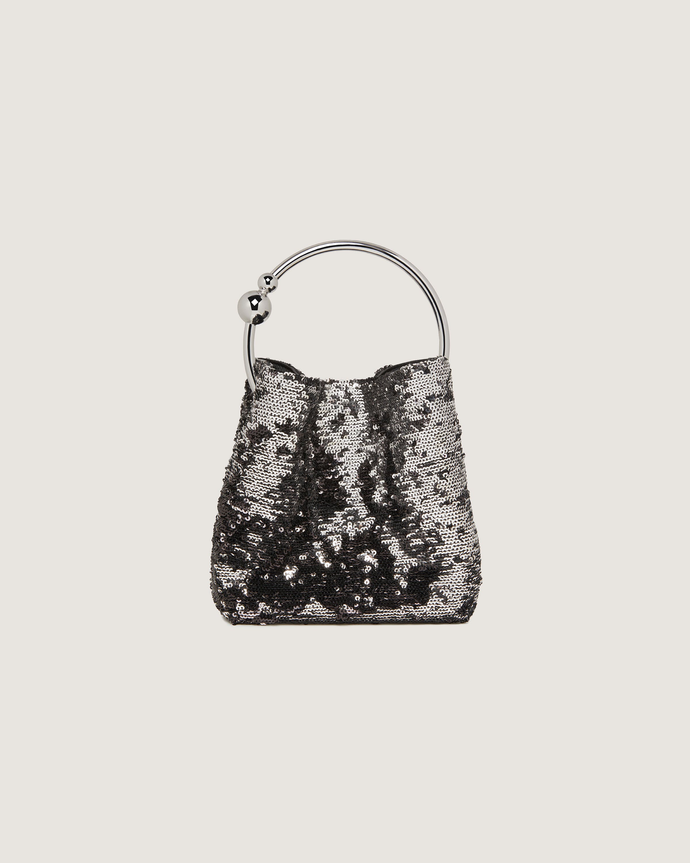 A black and white sequin bag on a white background