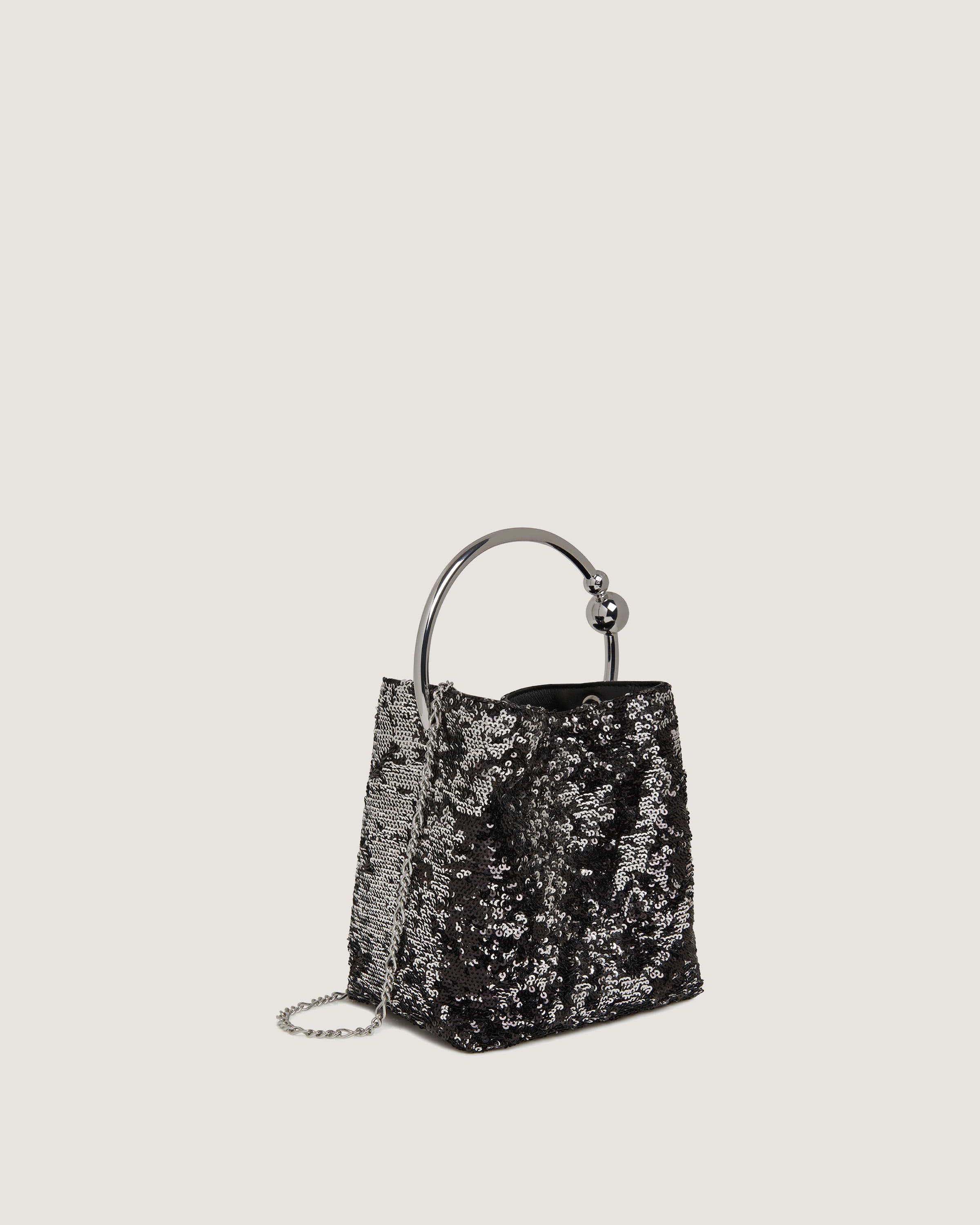 A black and silver handbag on a white background