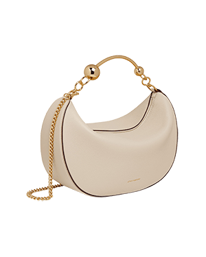 A white purse with a gold chain