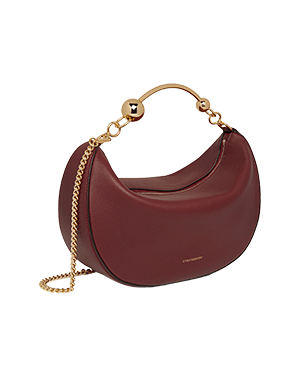 A red handbag with a gold chain