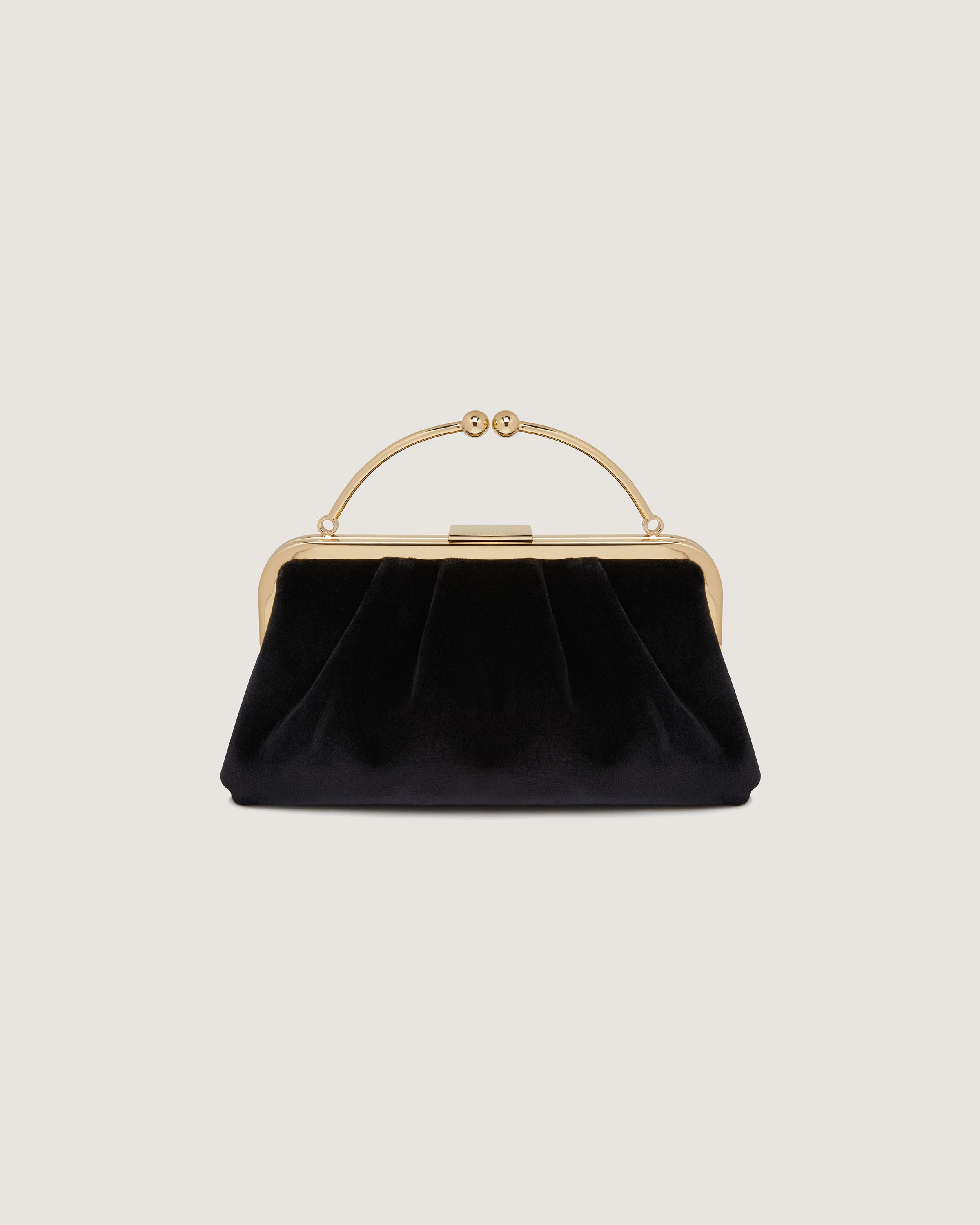 A black velvet purse with a gold handle