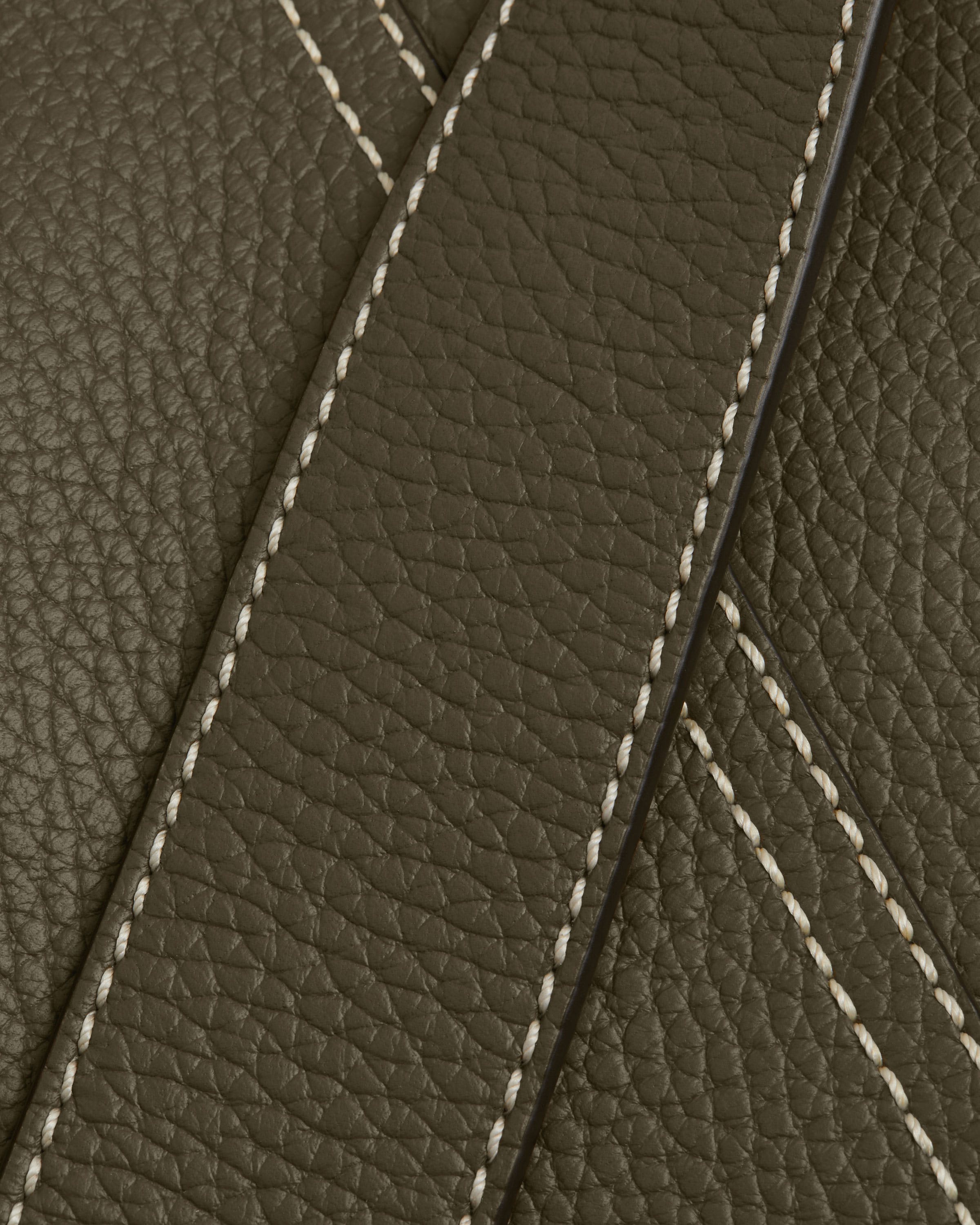 A close up of a brown leather texture