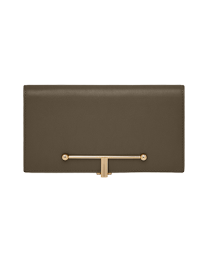 A brown clutch bag with a gold handle