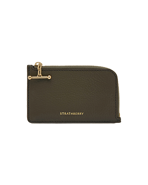 A brown leather wallet with a gold clasp