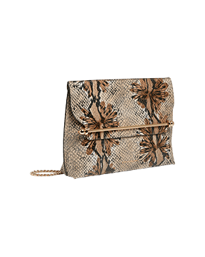 A snake skin clutch bag with a flower design