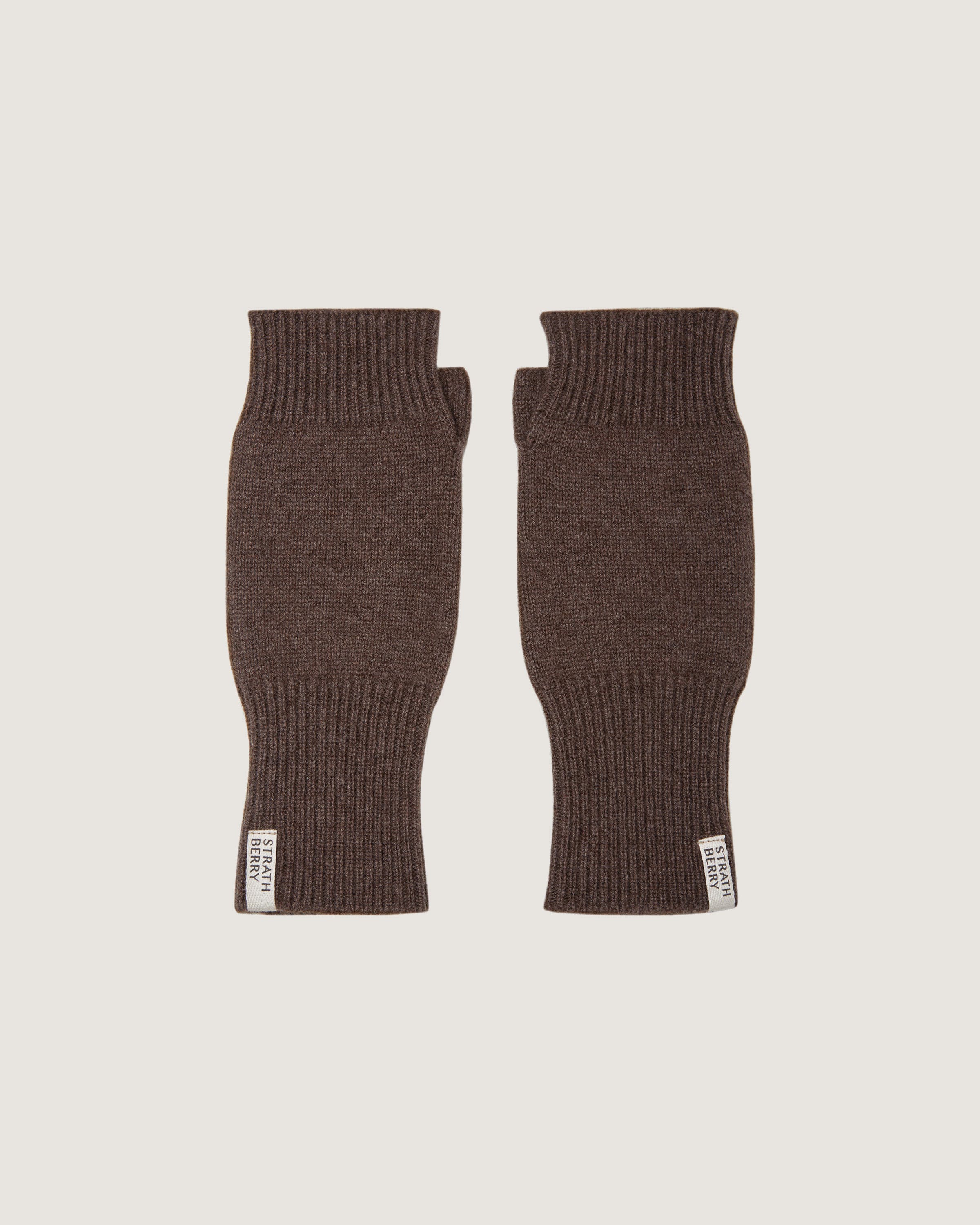 A pair of brown knitted gloves on a white background