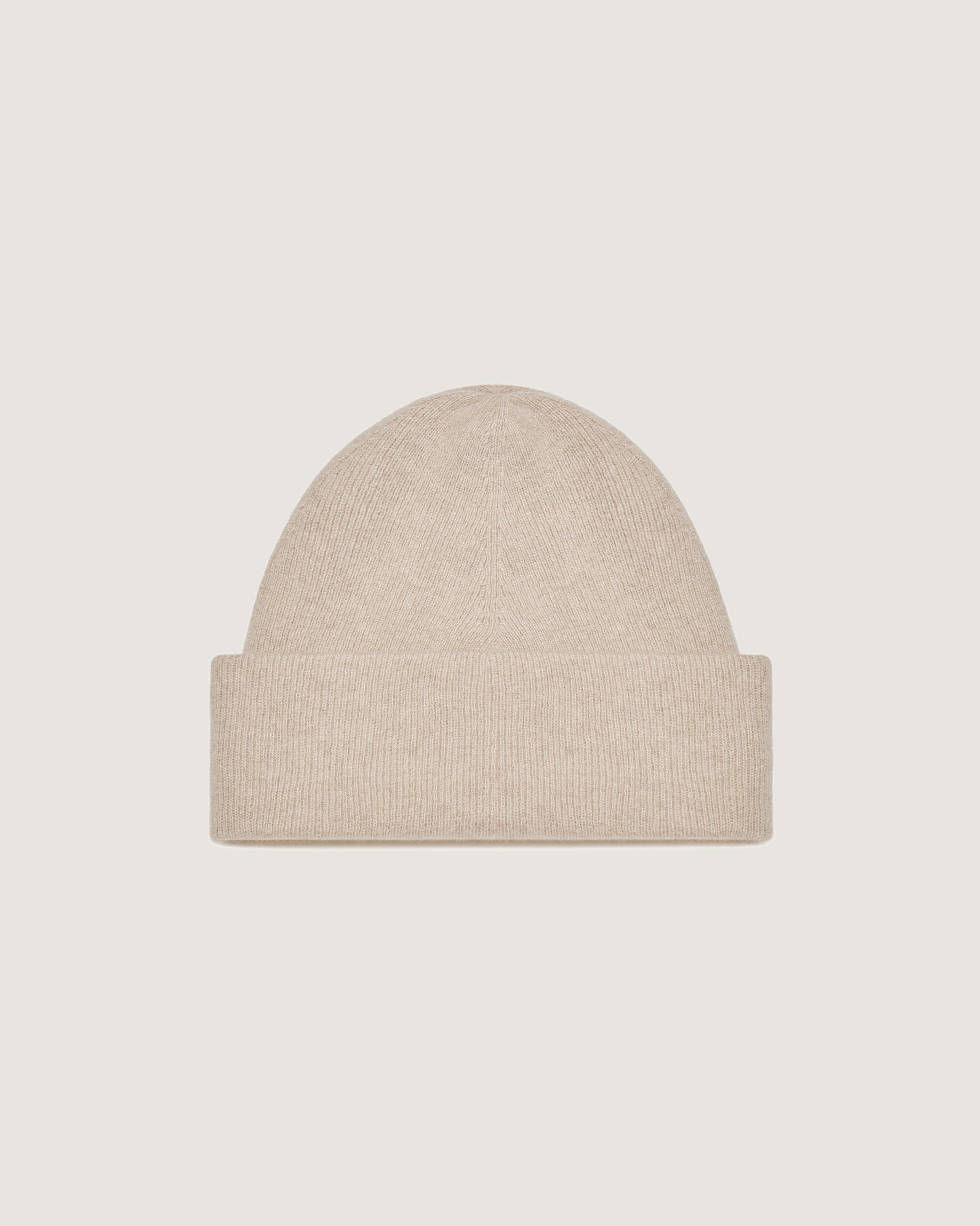 A beige hat on a white background