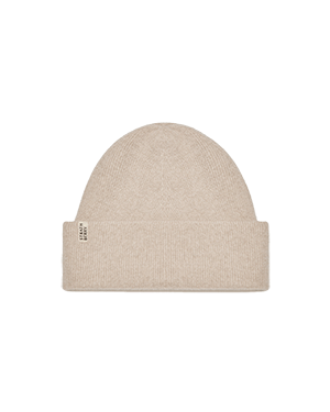 A beige beanie hat on a white background