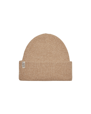 A beige beanie hat with a white tag on it