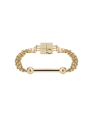 A gold bracelet with two balls and a bar