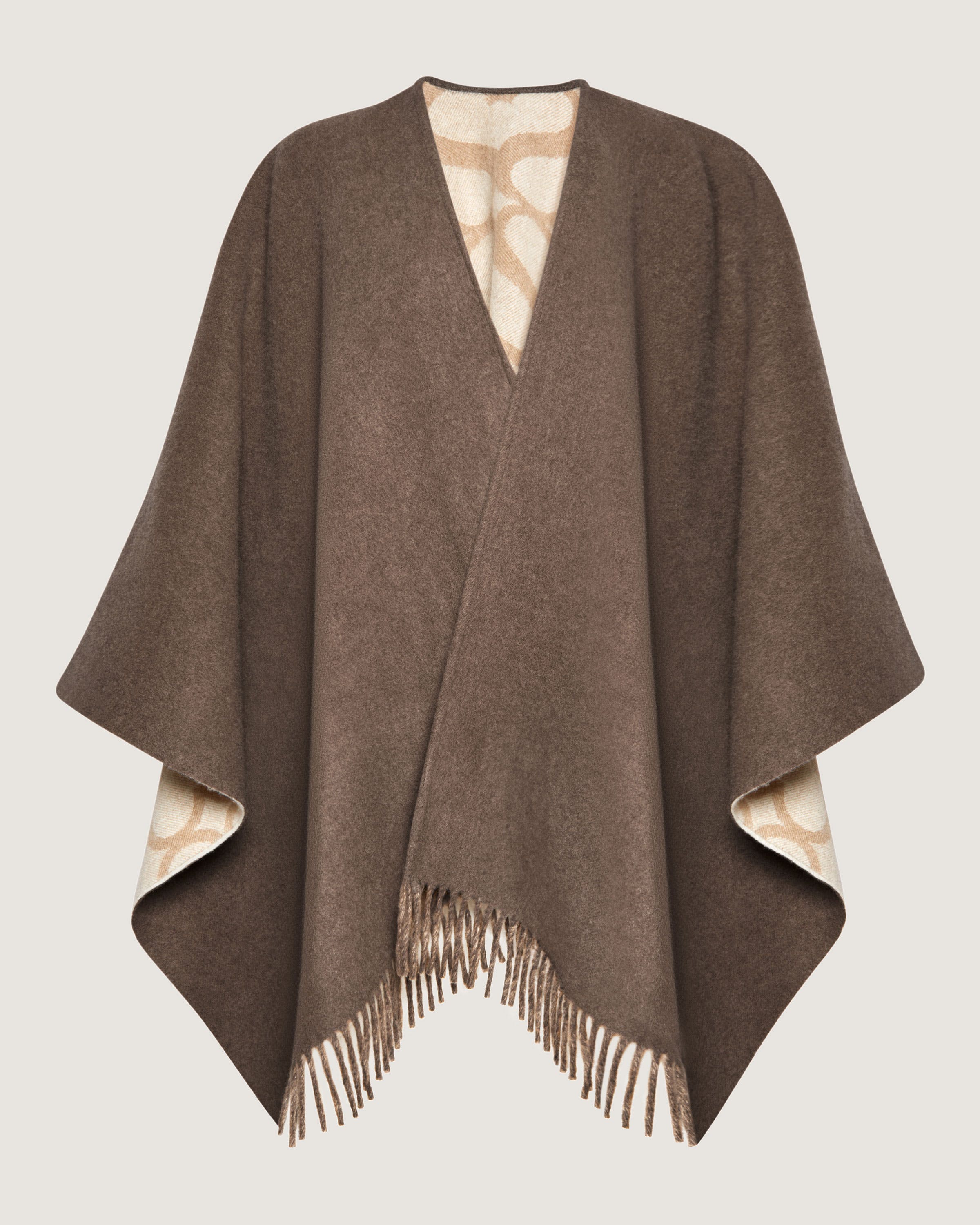 A brown shawl with fringes on it