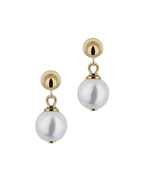 A pair of earrings with pearls on a green background