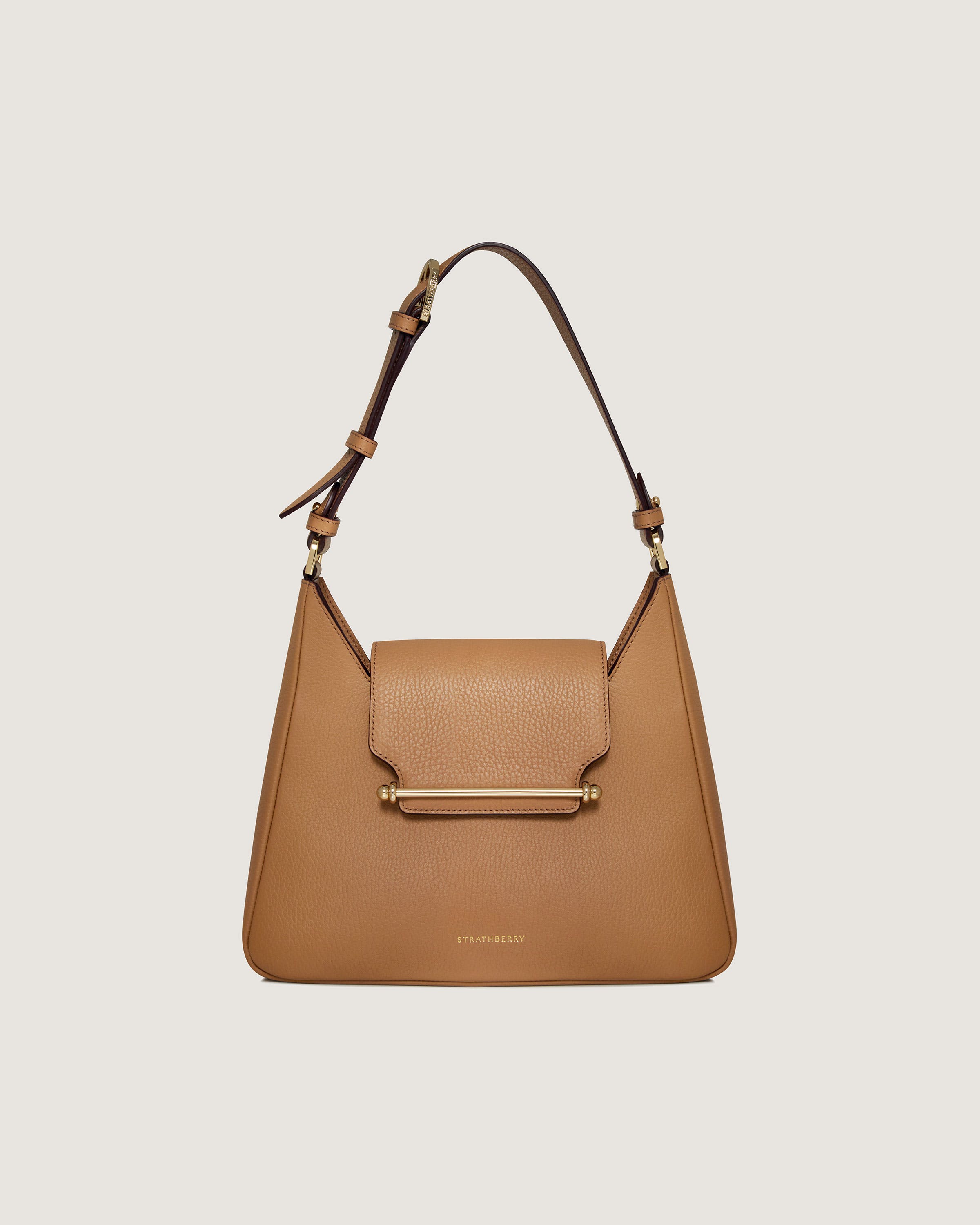 A brown handbag on a white background