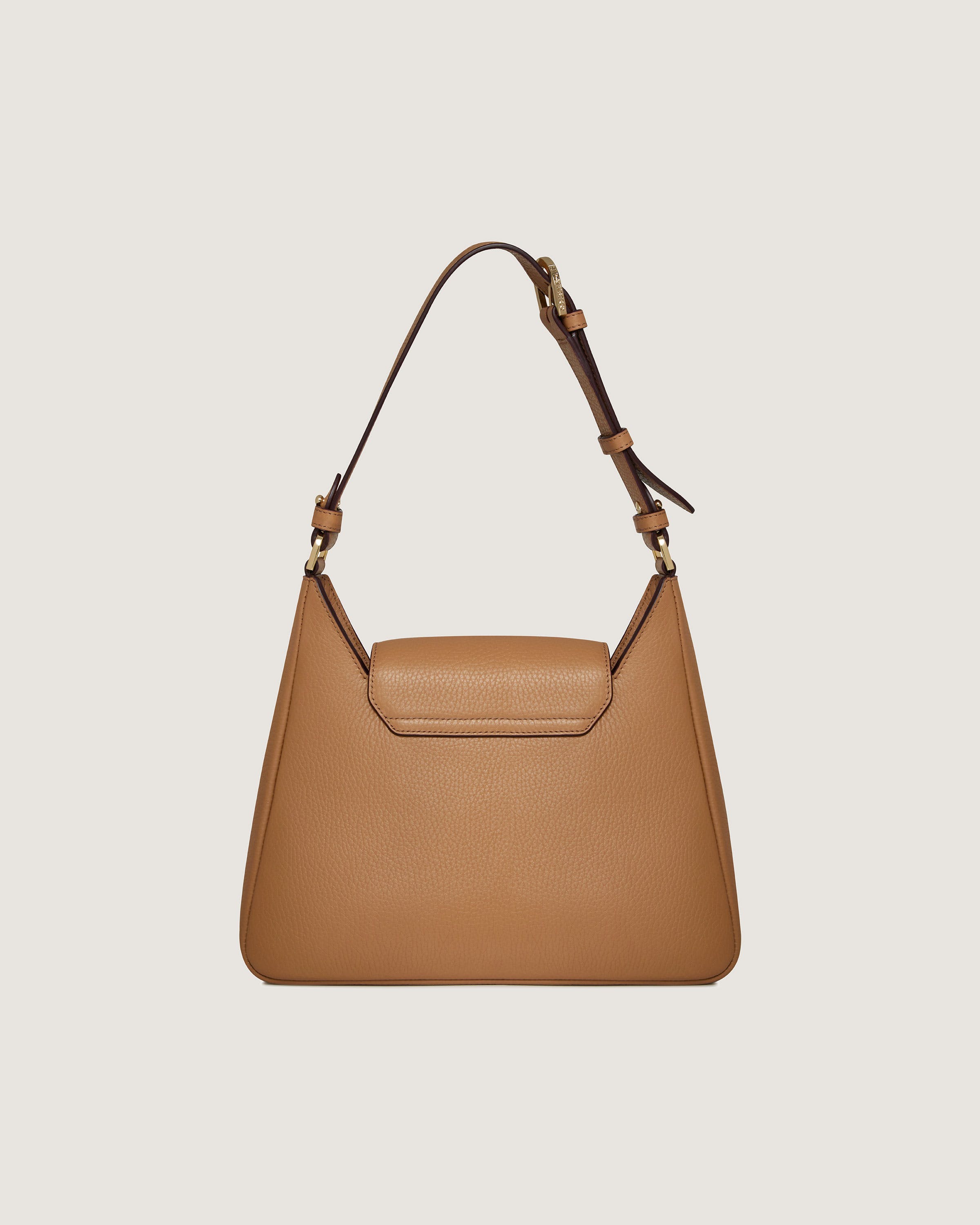 A brown handbag on a white background