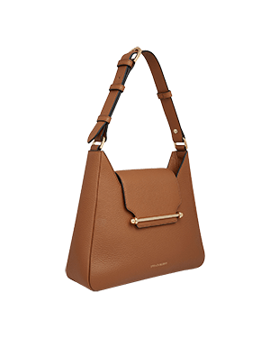 A brown handbag with a gold handle