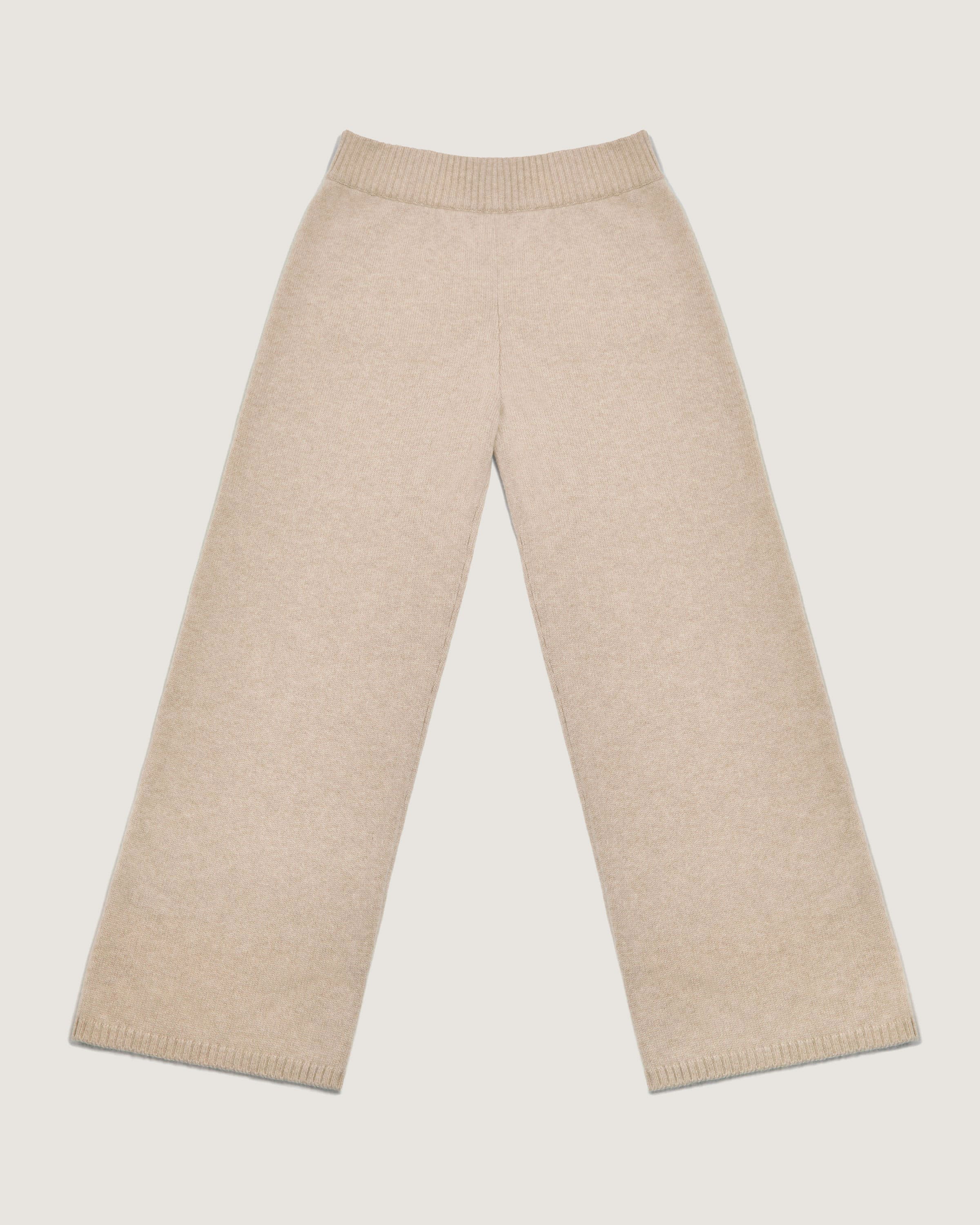 A pair of beige pants with a white background