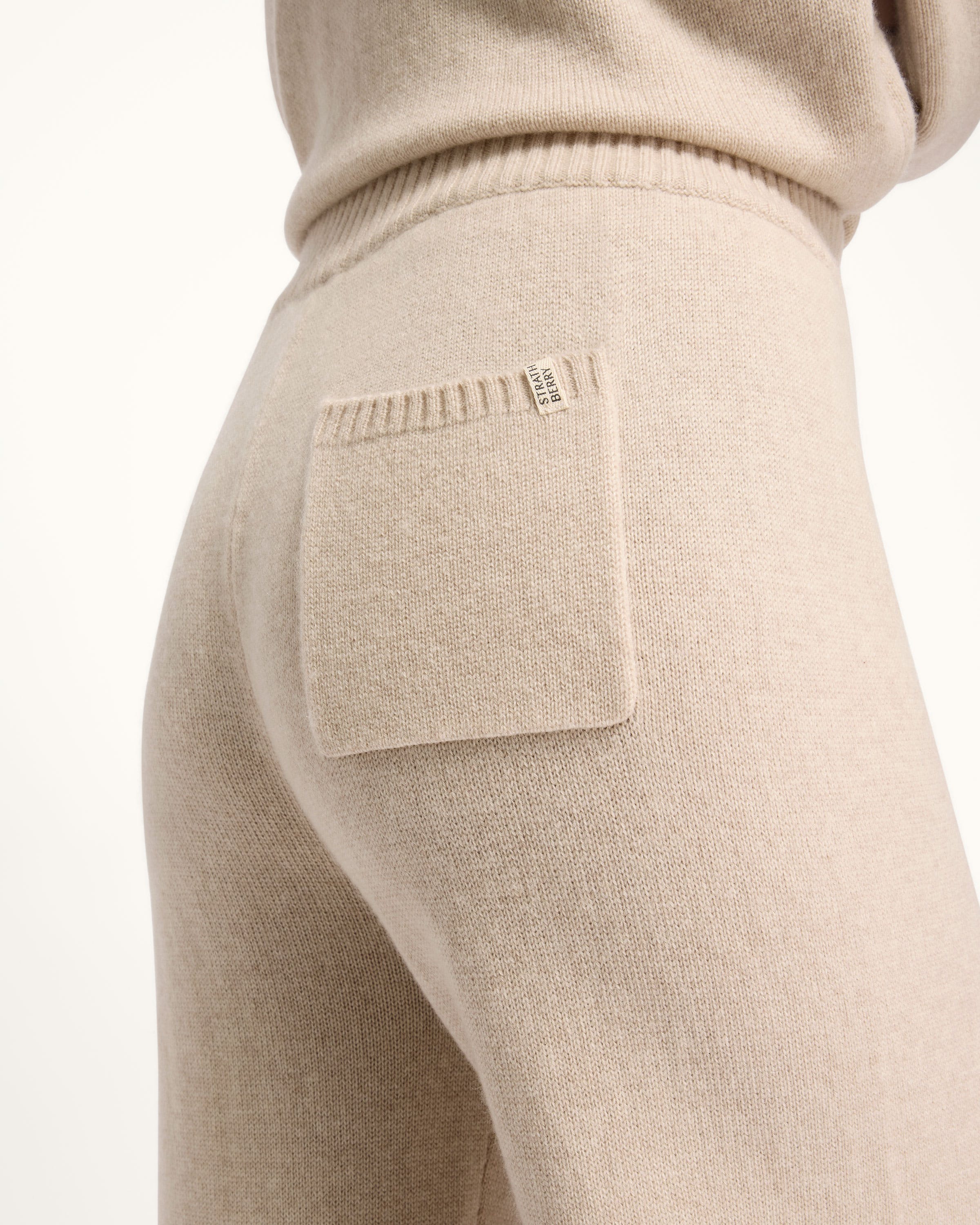 A close up of a person's pants with a pocket