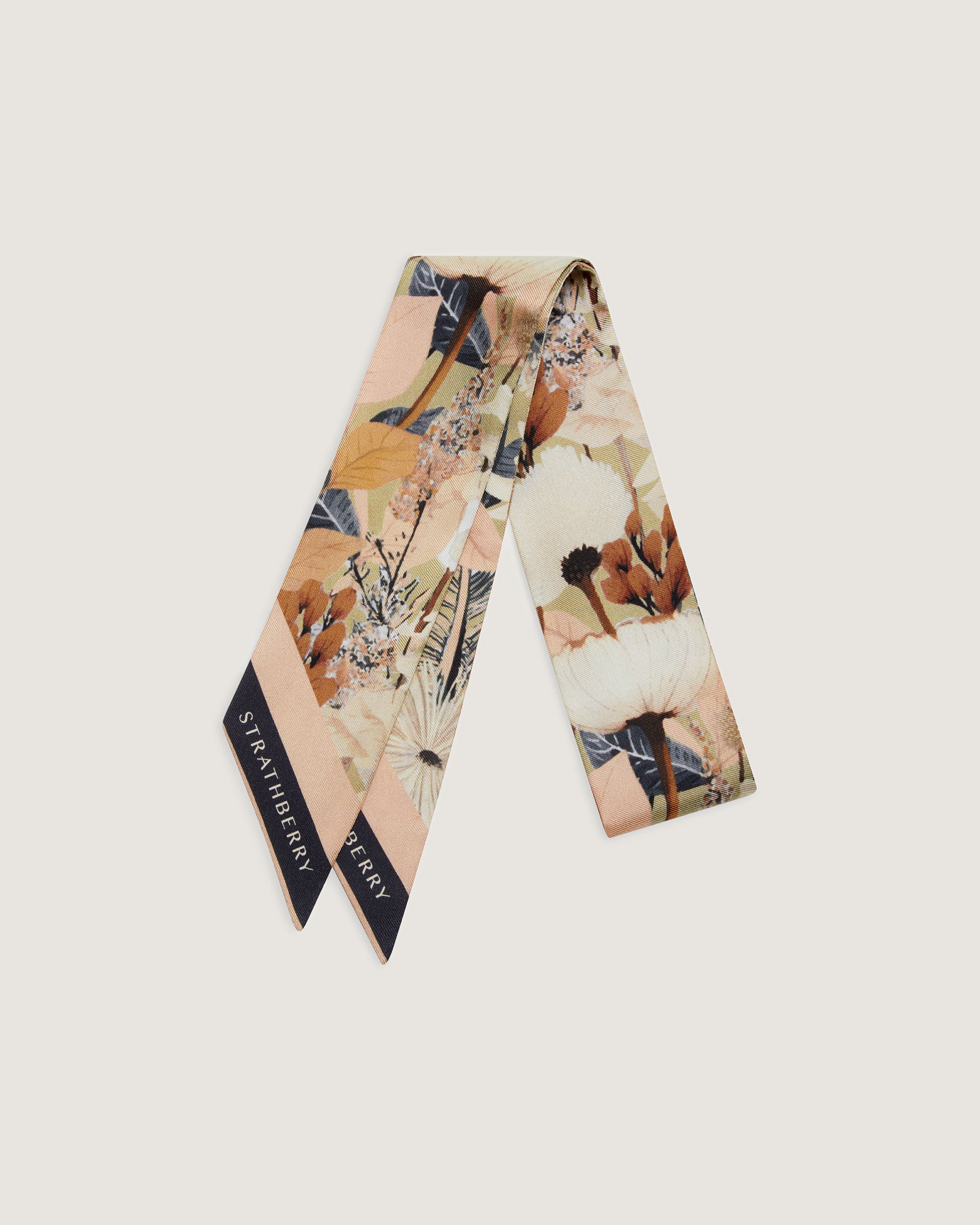 A scarf with a flower print on it