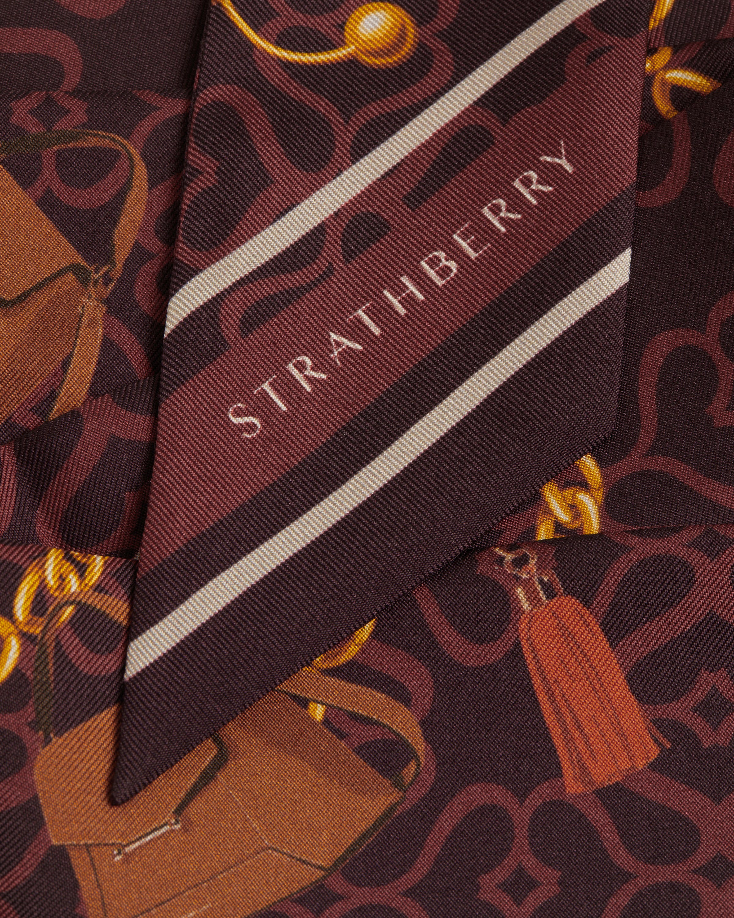 A close up of a tie with a name on it