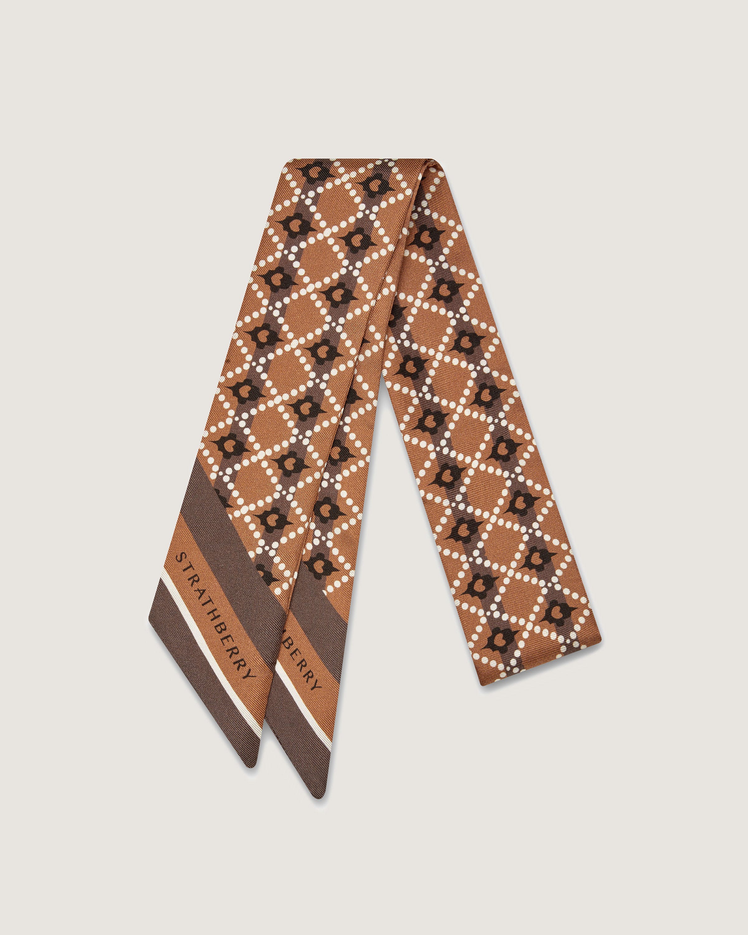 A brown and white tie on a white background