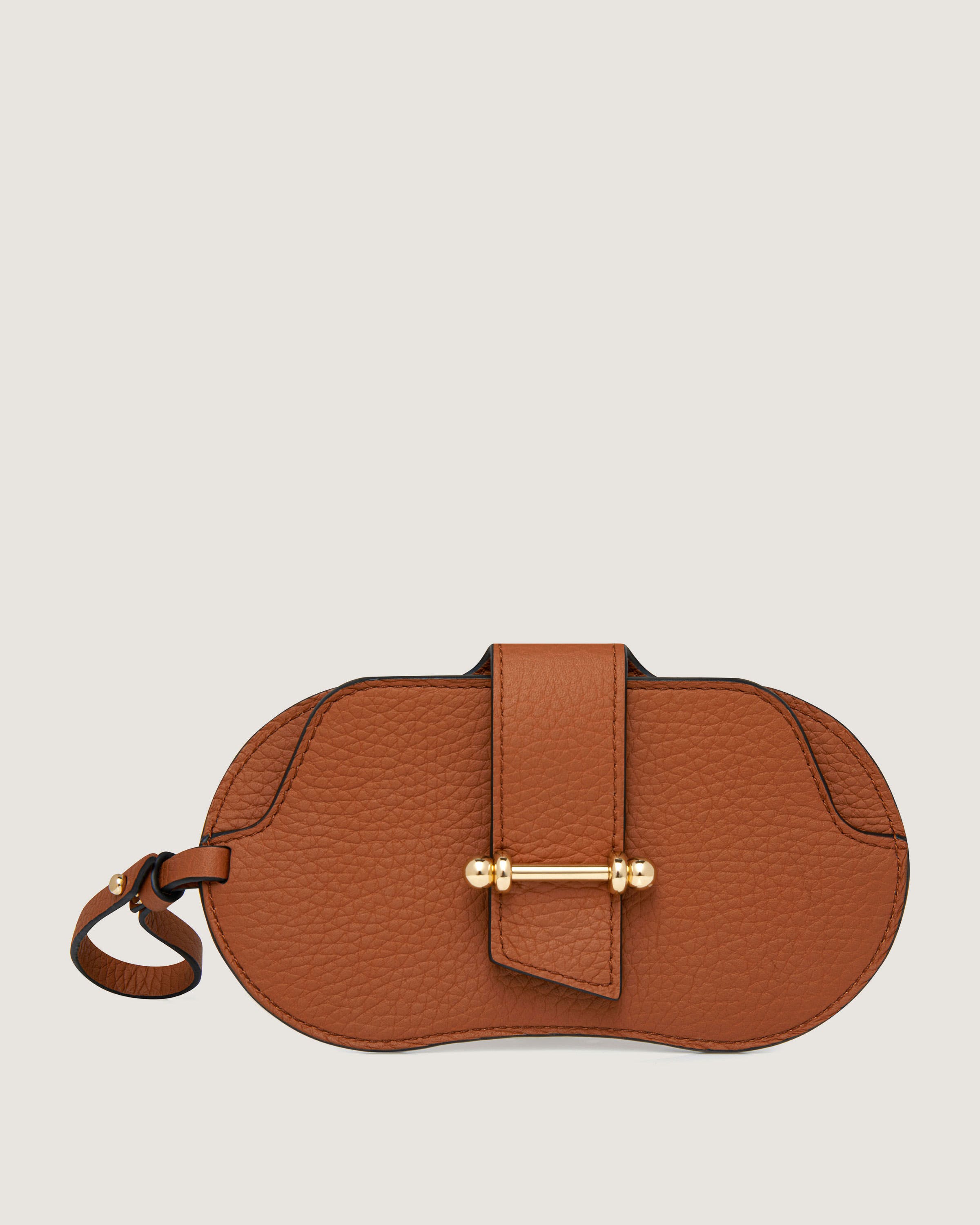 A brown leather purse with a gold handle