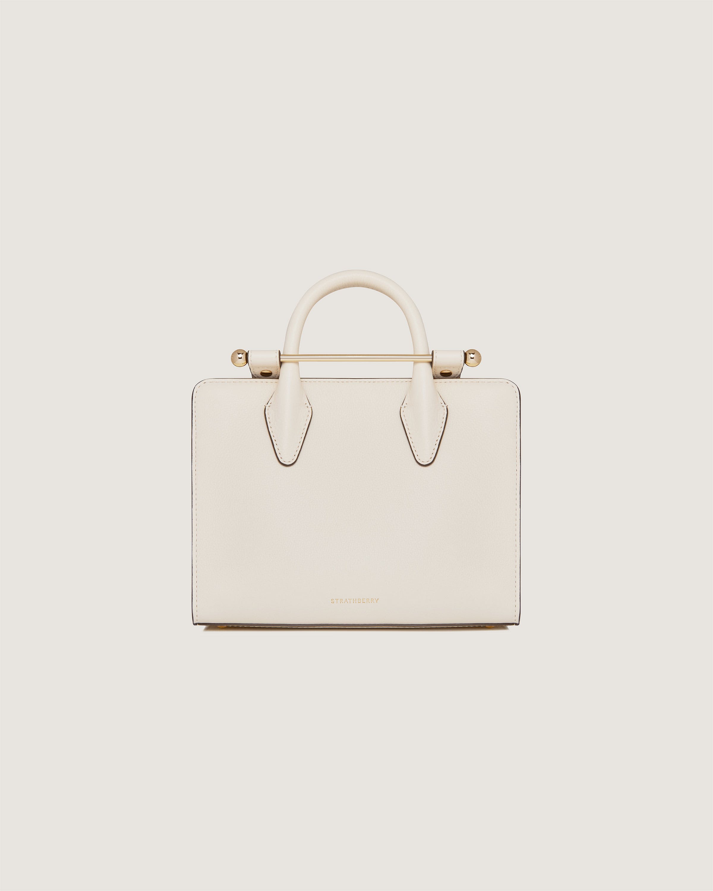 A white handbag on a white background