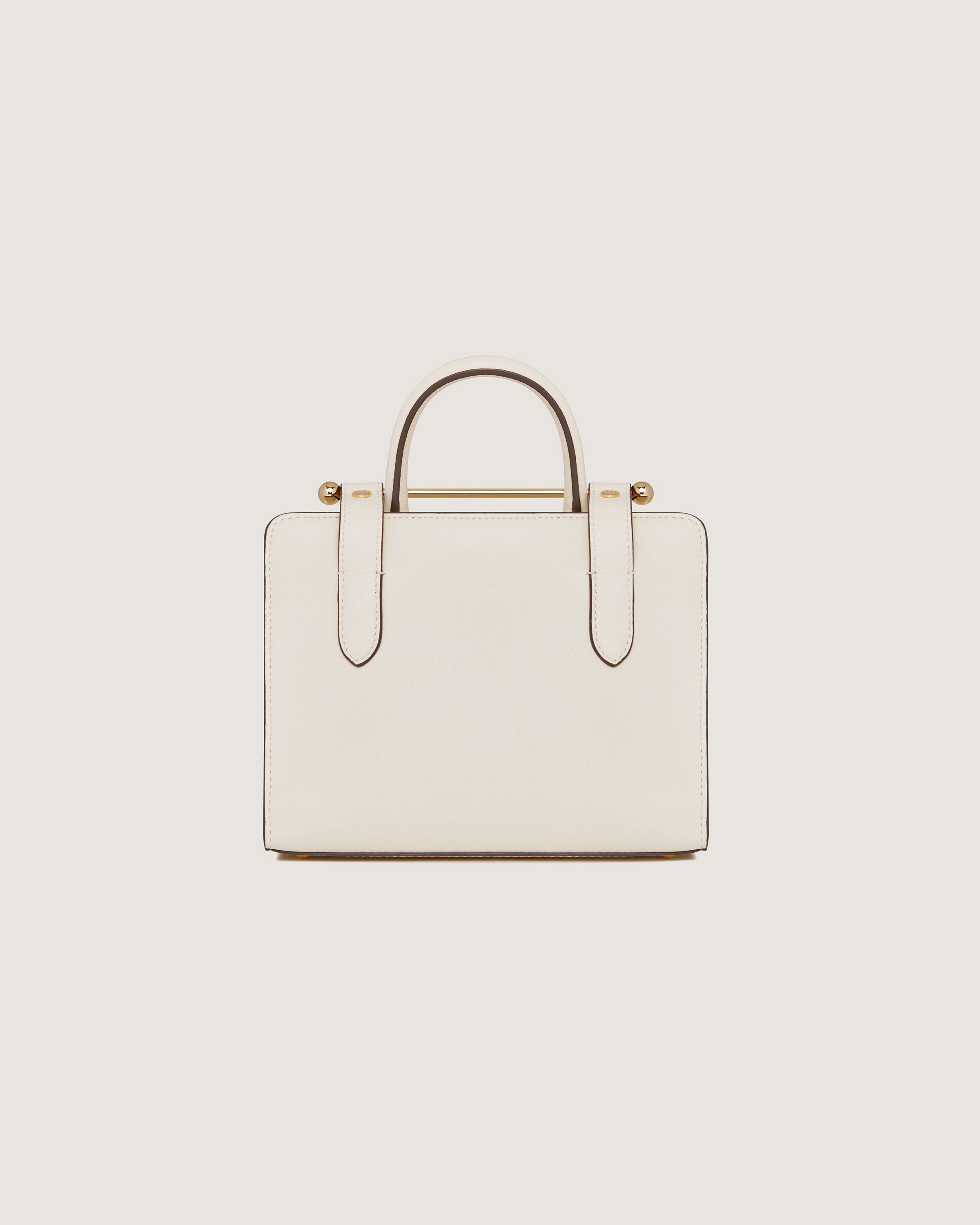 A white handbag on a white background