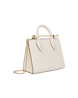 A white handbag with a gold chain