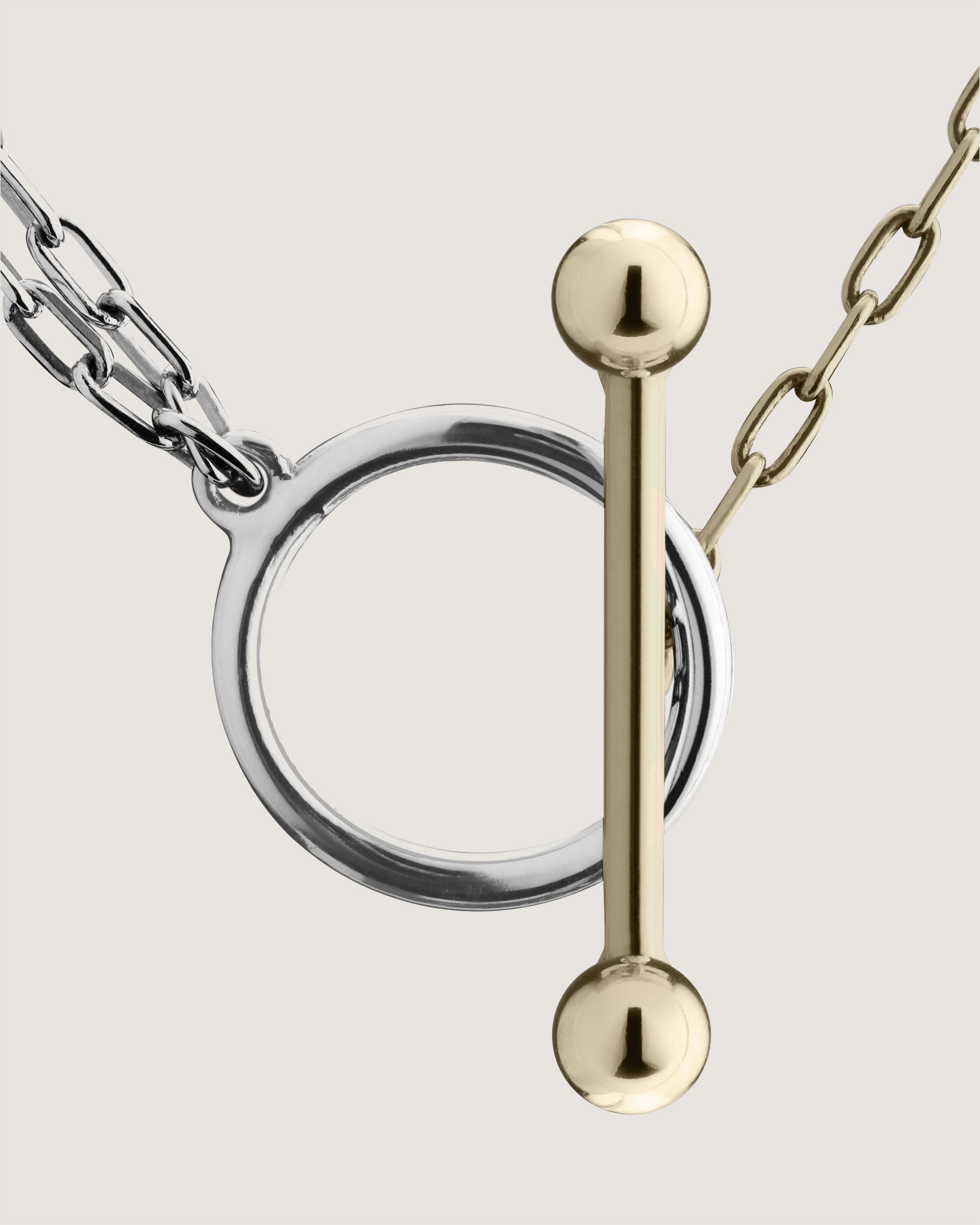 A metal object with a chain attached to it