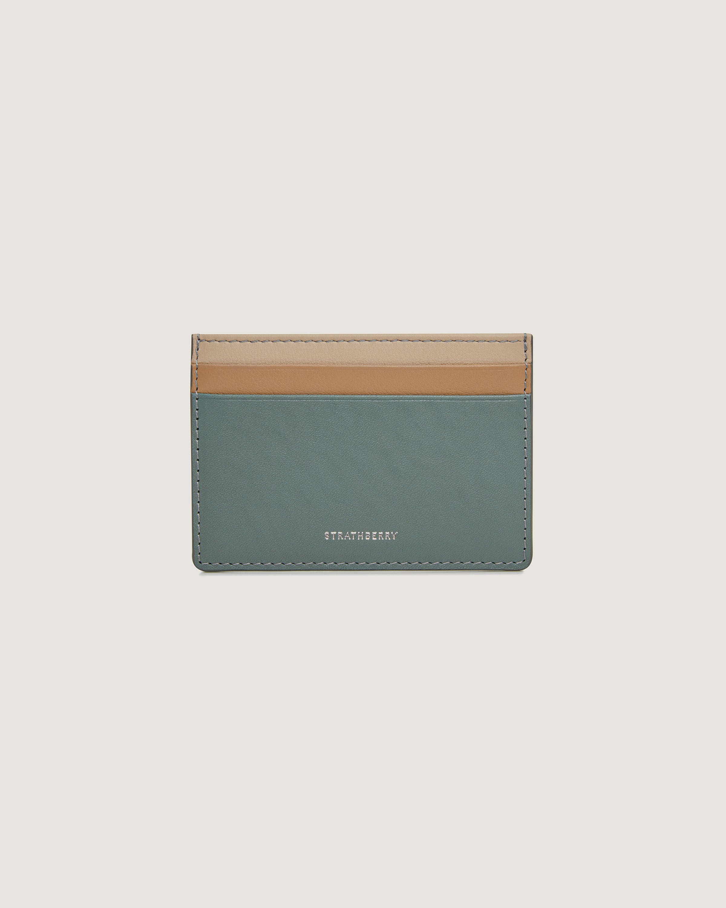 A card case with a card slot on top of it