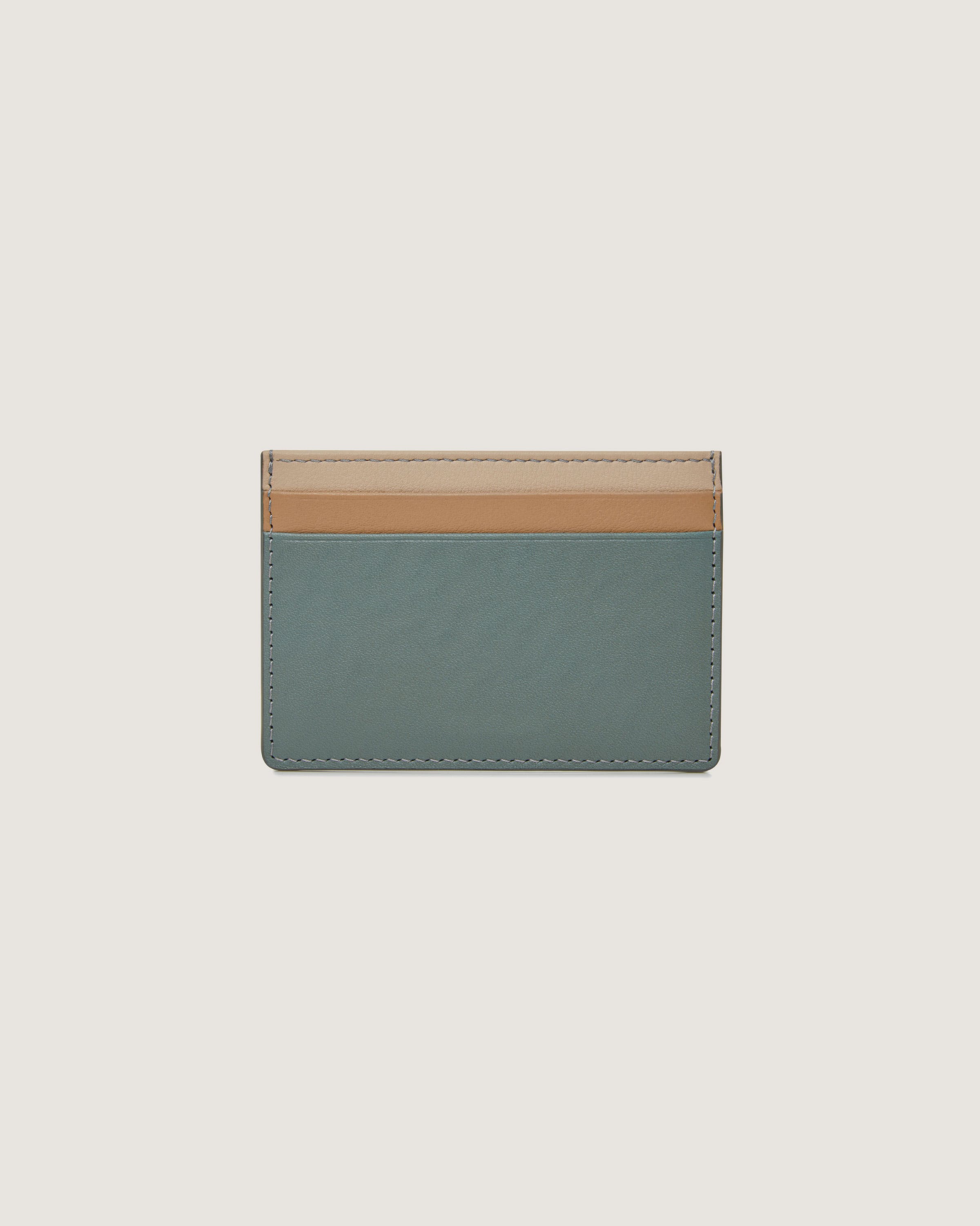 A card case with a tan and blue stripe