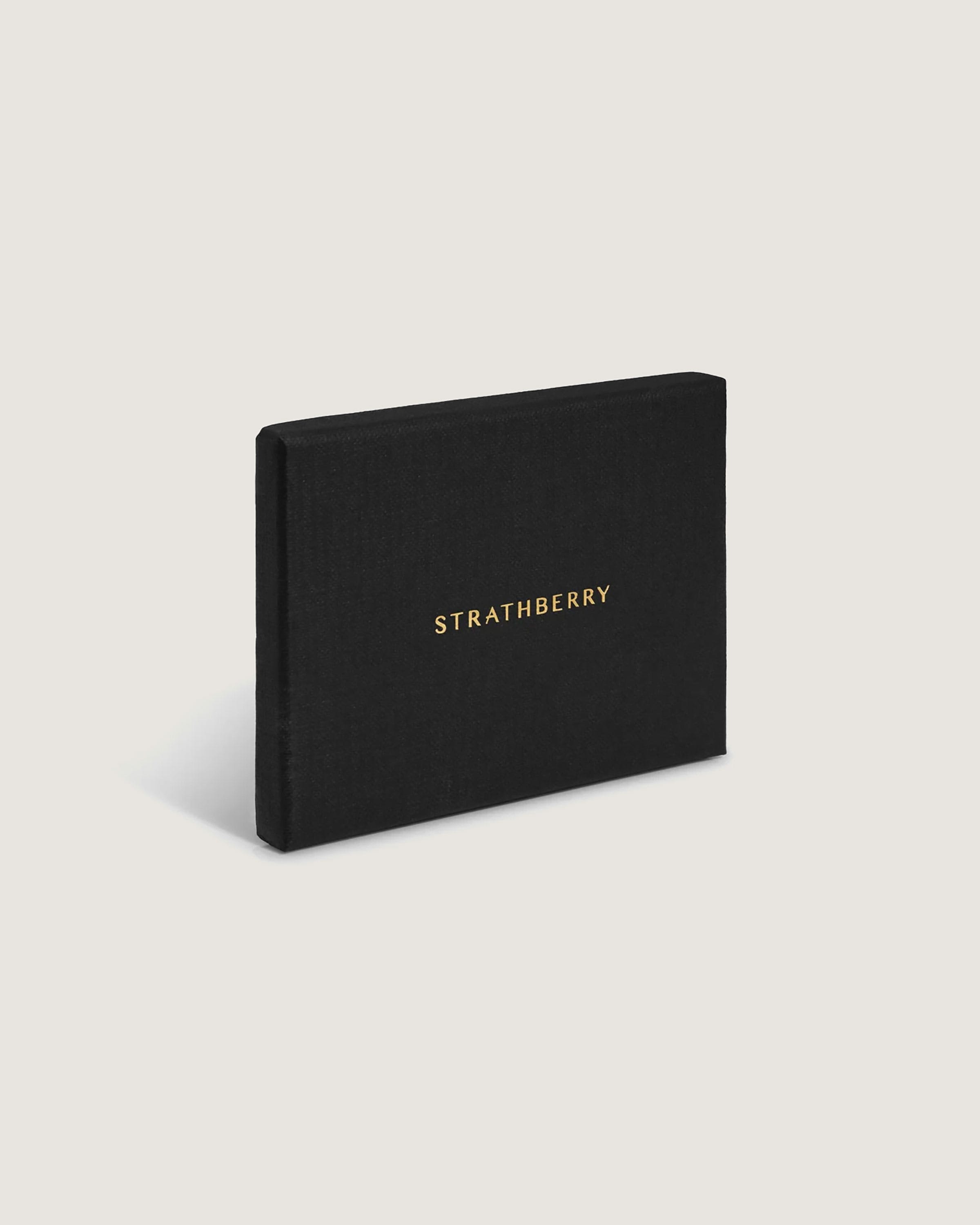 A black book with gold lettering on it