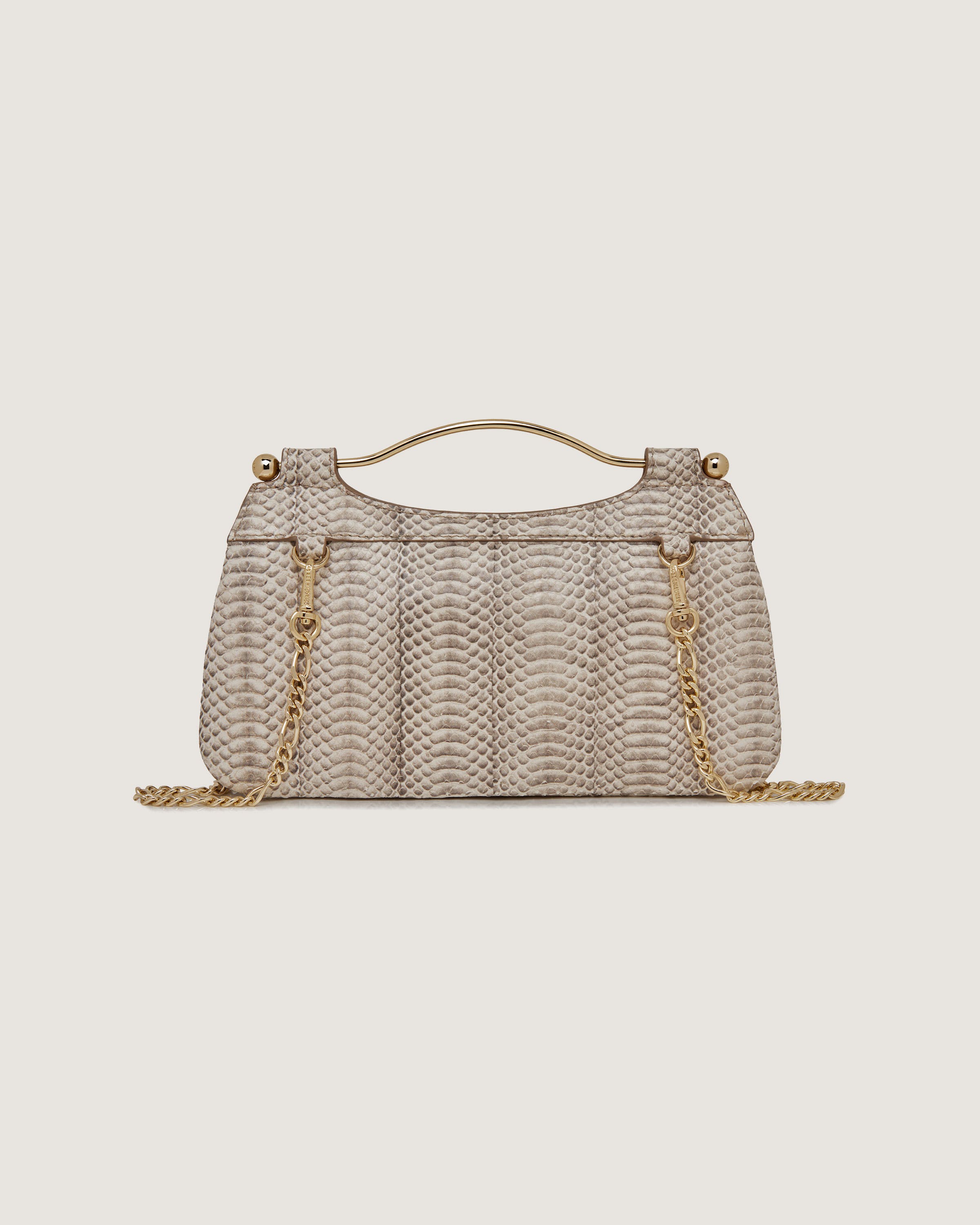 A beige snake skin bag with a gold chain strap