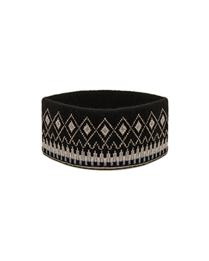 A black and white patterned headband